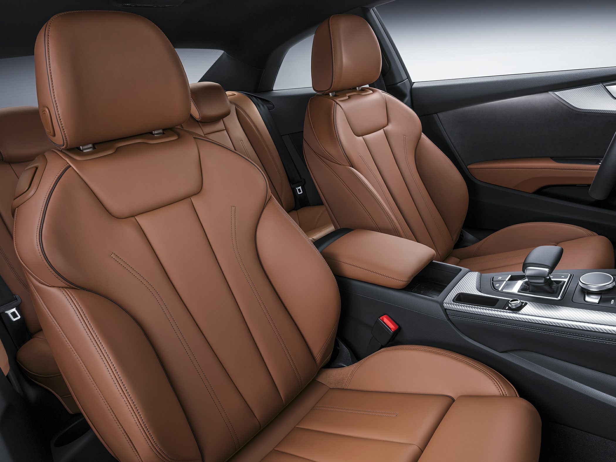 Brown leather seats and modern center console interior