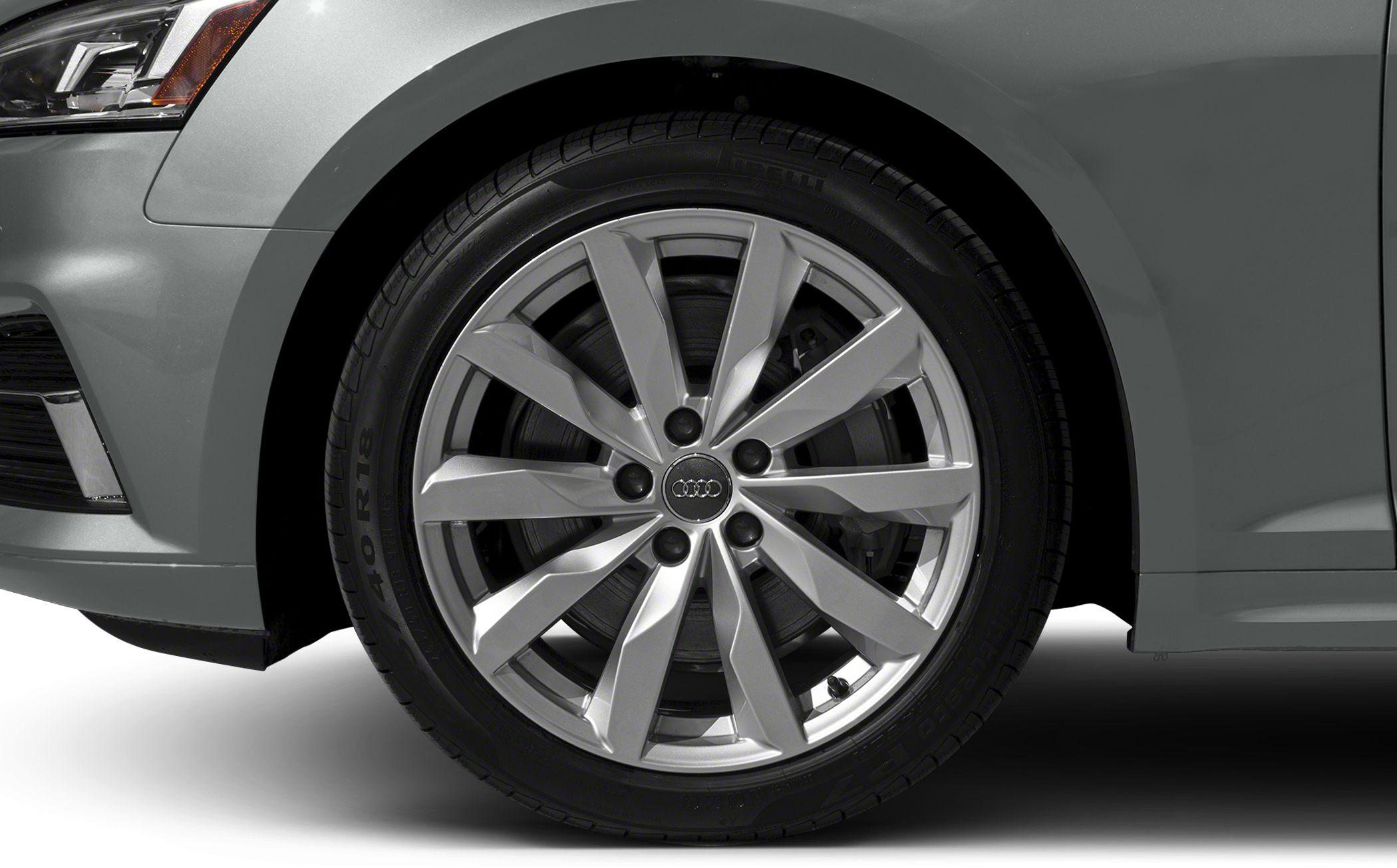 Close-up of a sleek multi-spoke alloy wheel and tire on a modern vehicle
