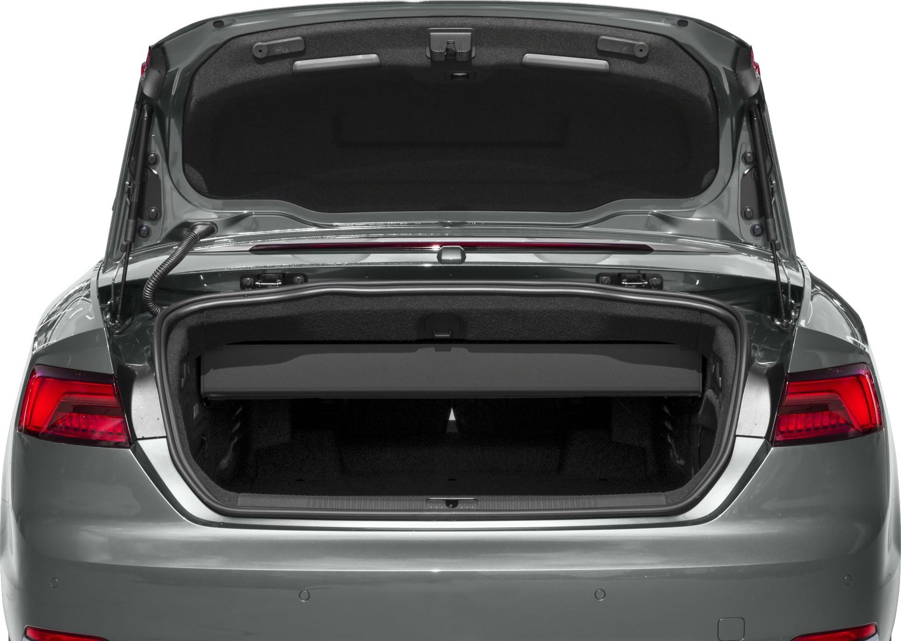 Open trunk of convertible with spacious storage and rear taillights visible