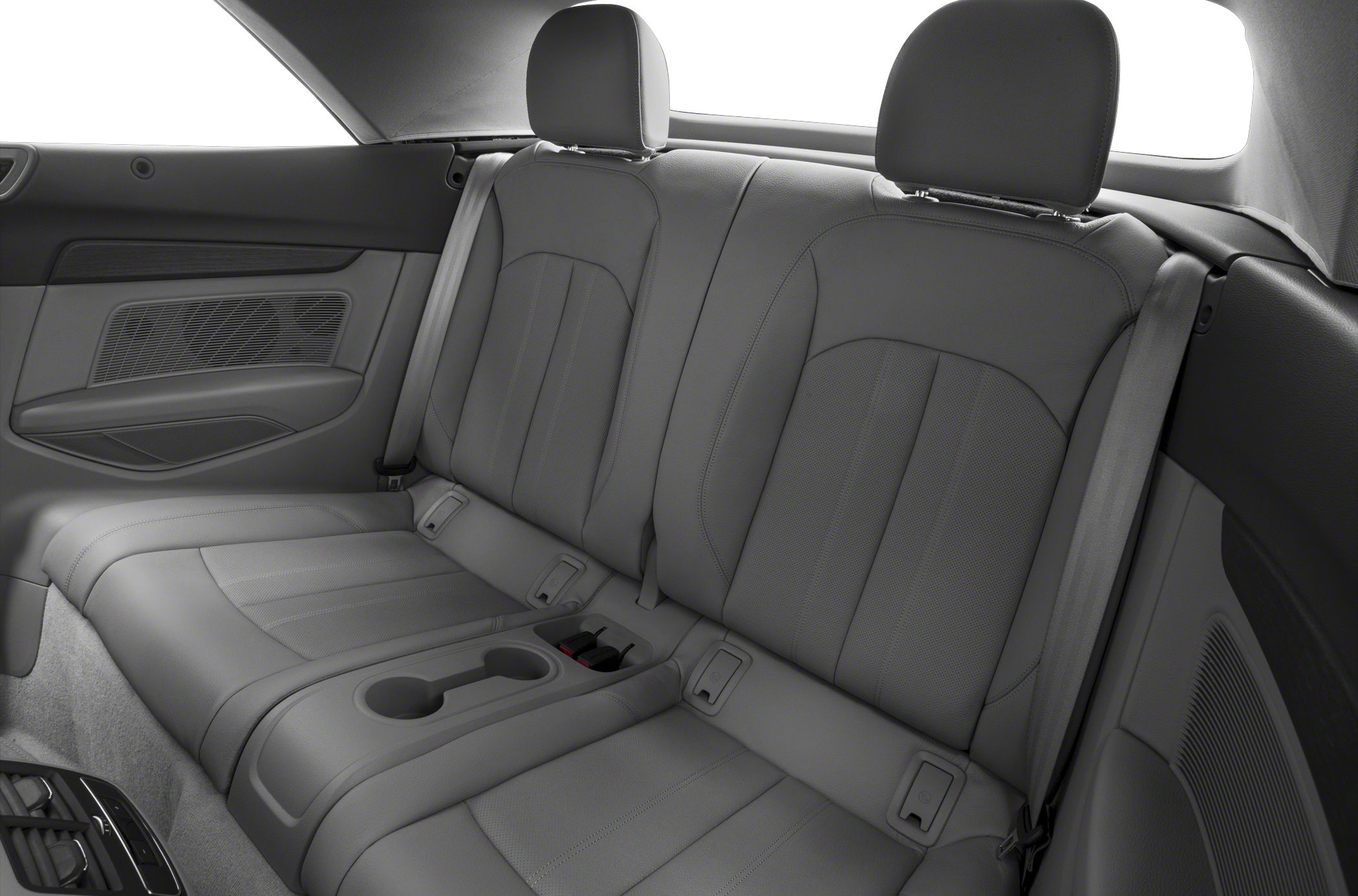 Rear leather seats with headrests and cup holders