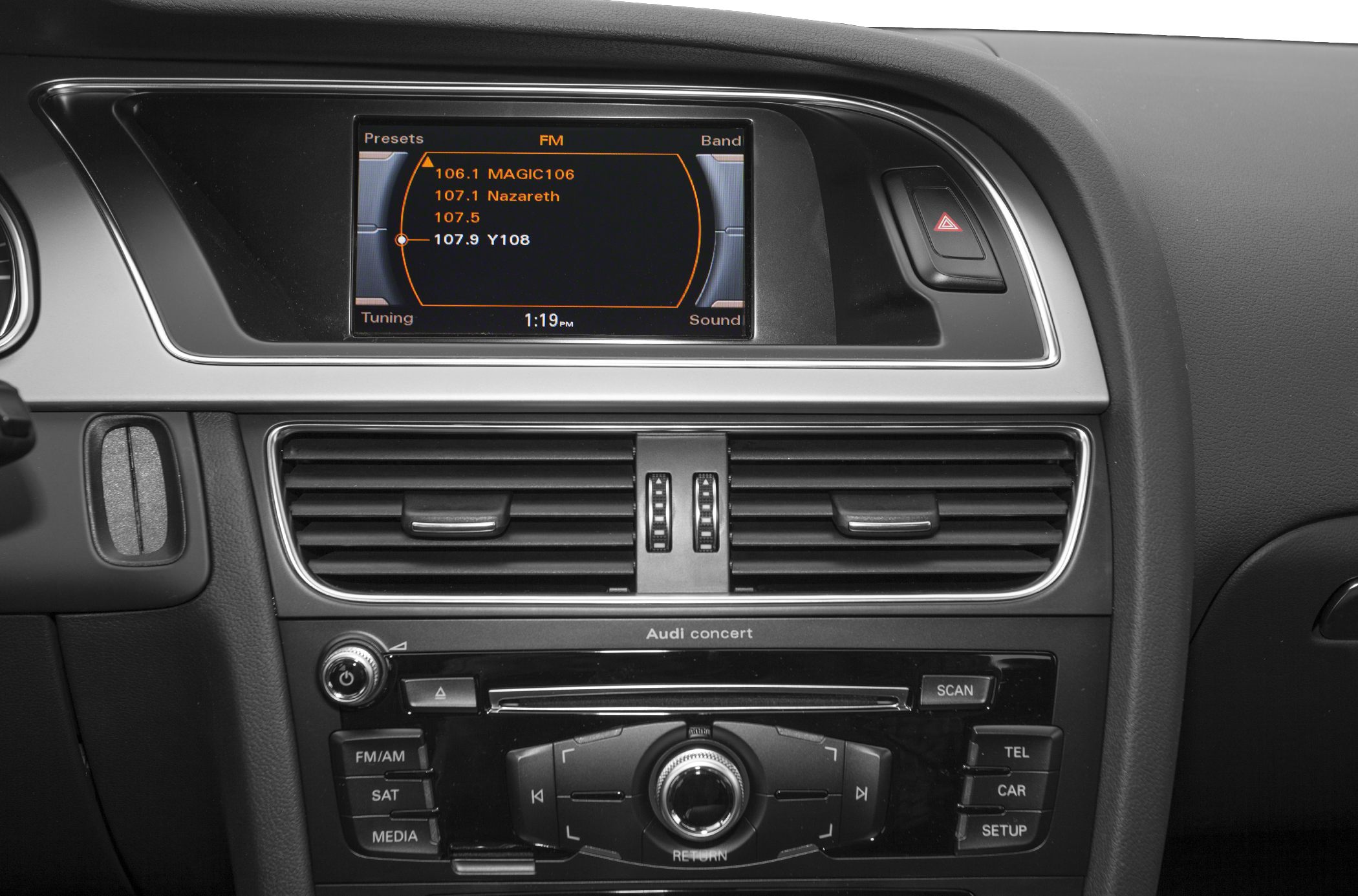 Audi A5 multimedia system and dashboard controls with FM radio display