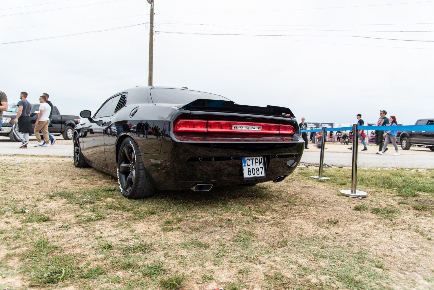 Sleek rear view with LED tail lights and dual exhaust.