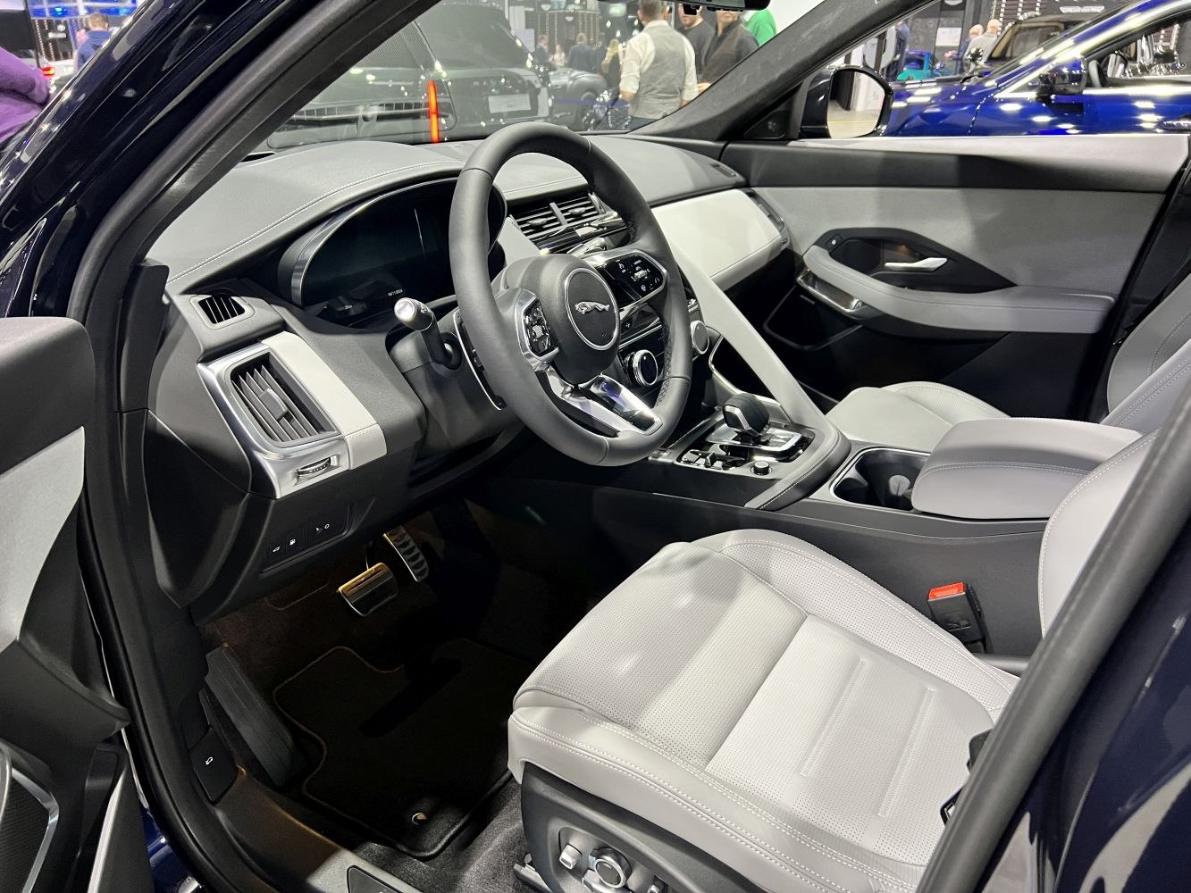 Modern luxury SUV interior with digital dashboard and premium seats
