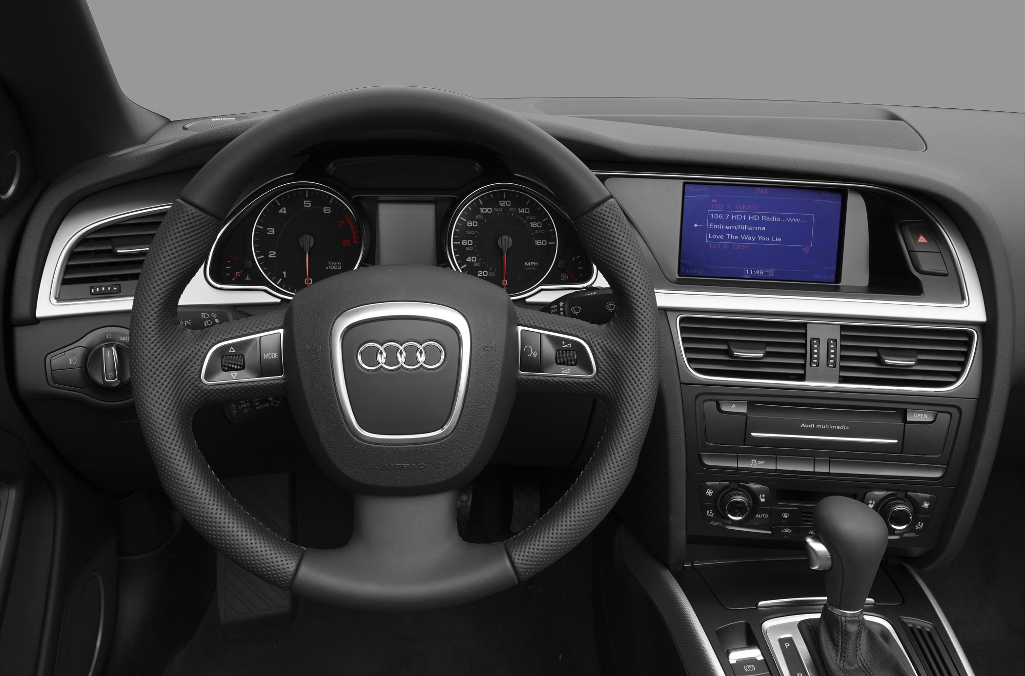 Audi interior dashboard with steering wheel and multimedia display