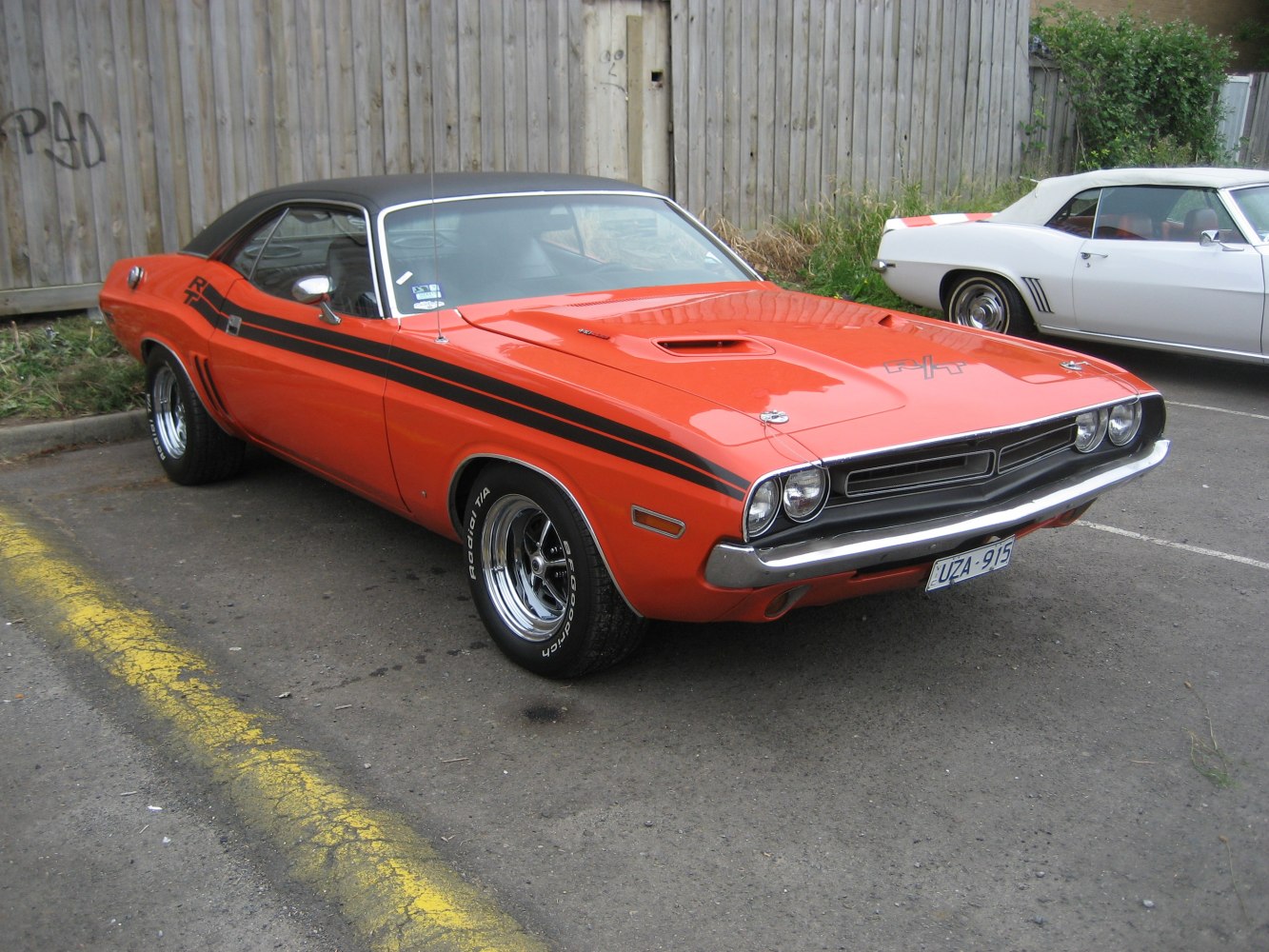 Classic muscle car with hood scoop and R/T side stripes