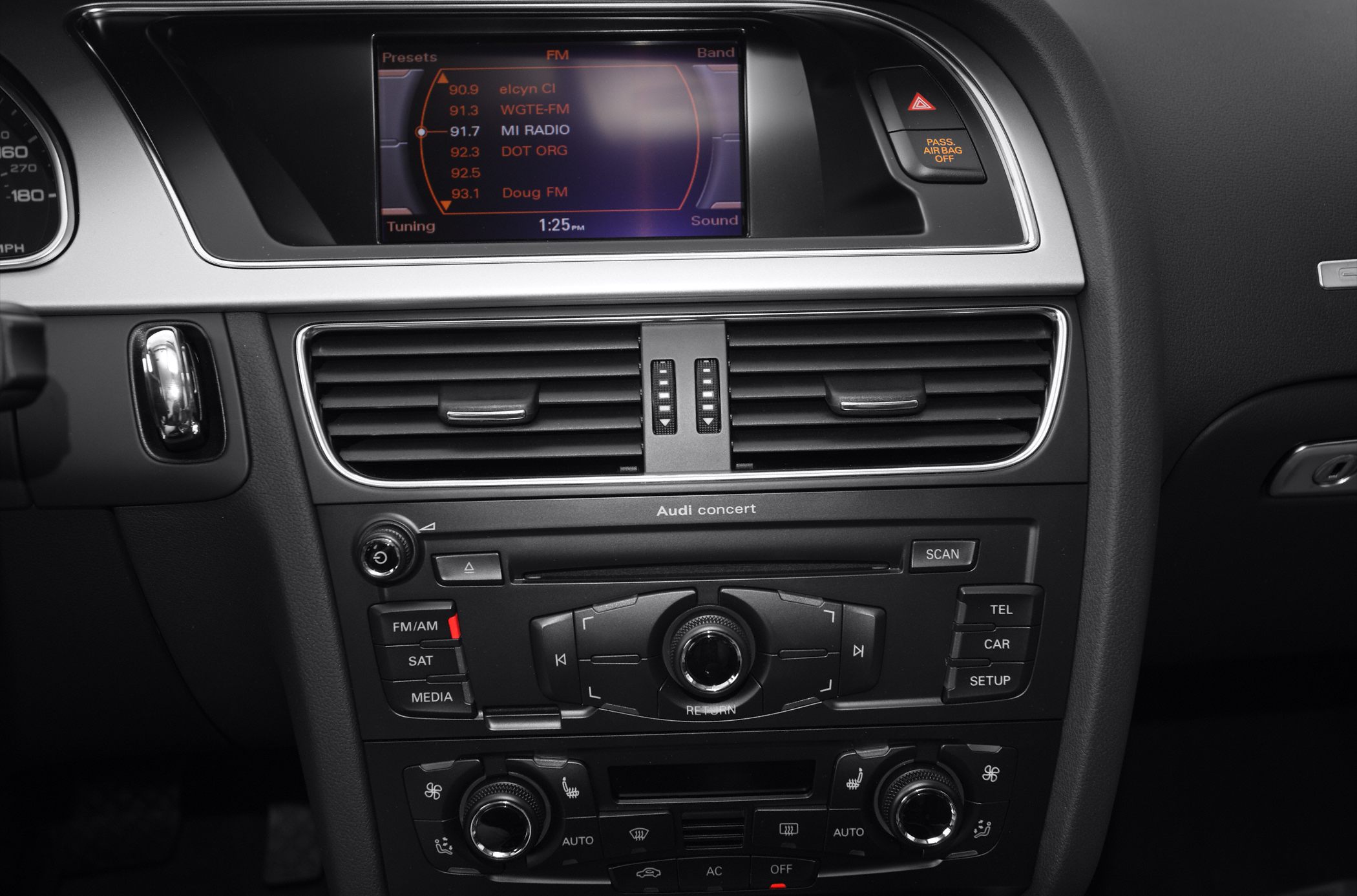 Audi dashboard with radio and climate control panel