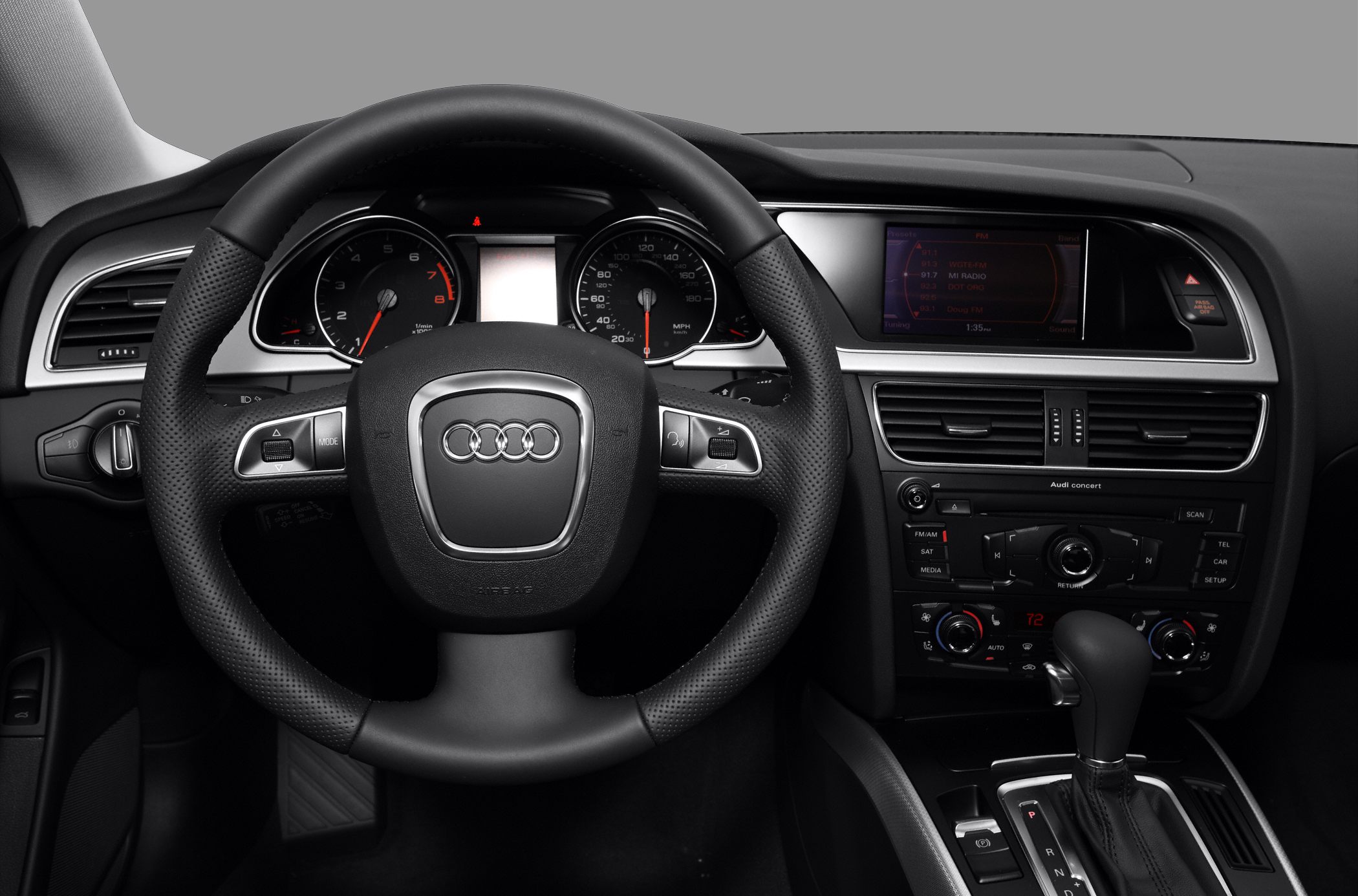 Steering wheel and dashboard with infotainment and gear shift