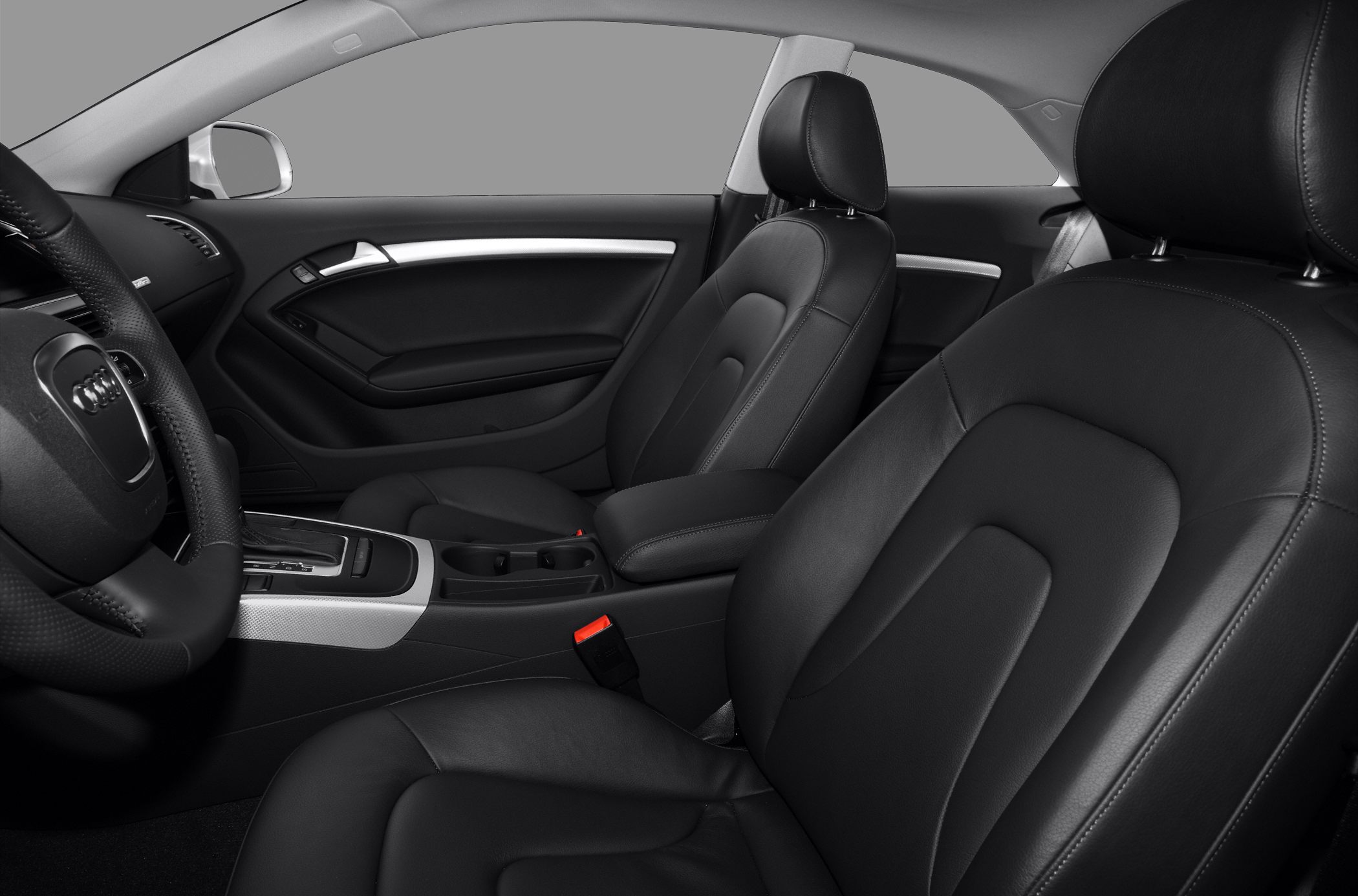 Luxury black leather seats with modern center console and door panel design