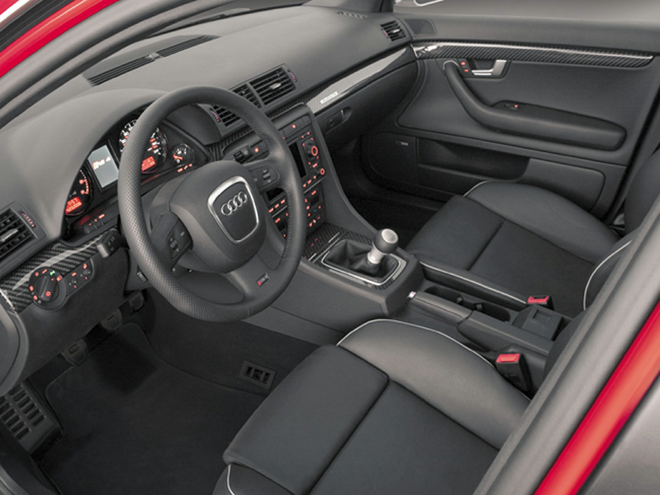 Interior with manual gearbox and carbon fiber dashboard trim