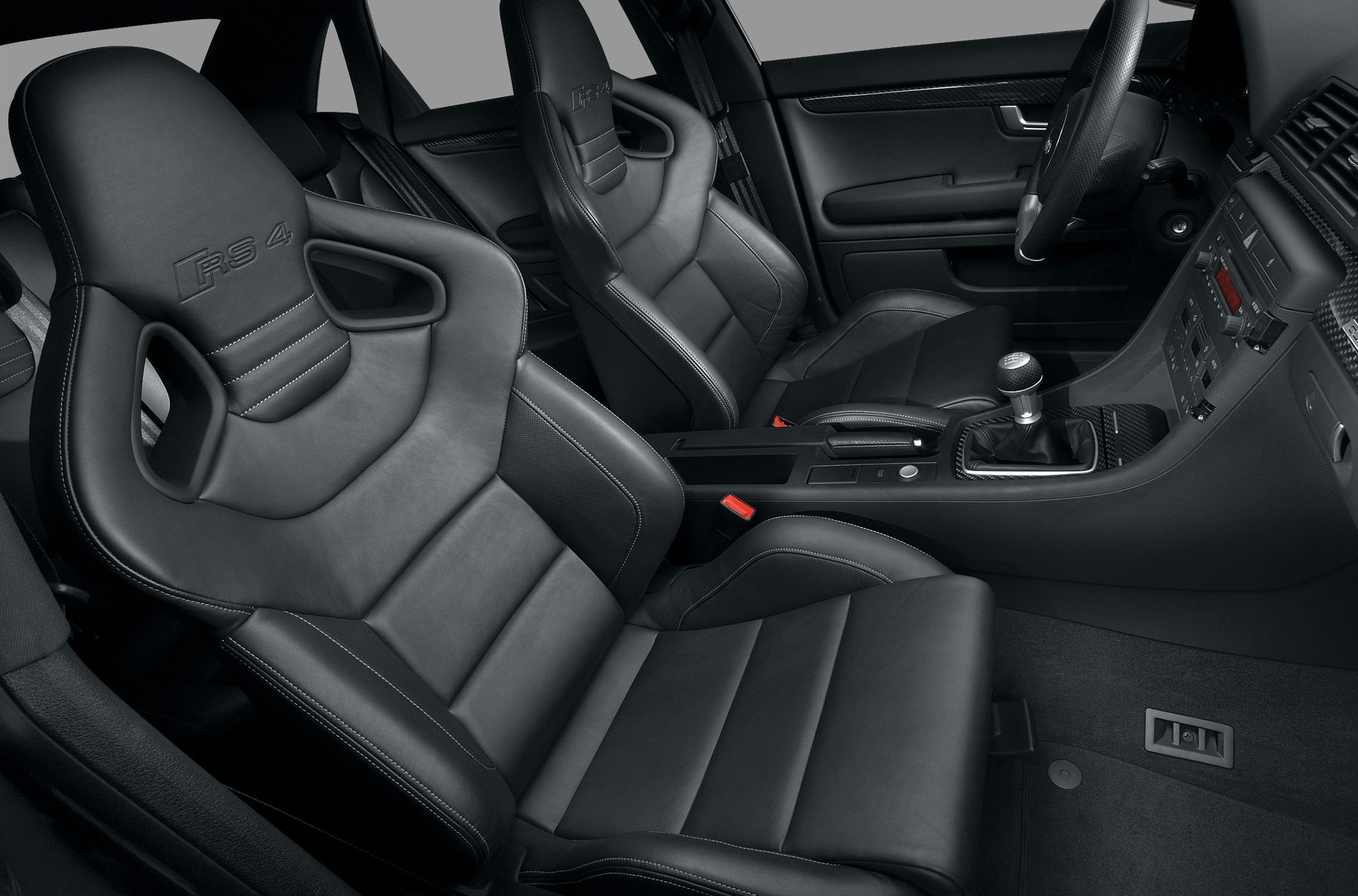 Sporty black leather bucket seats and manual gearbox interior