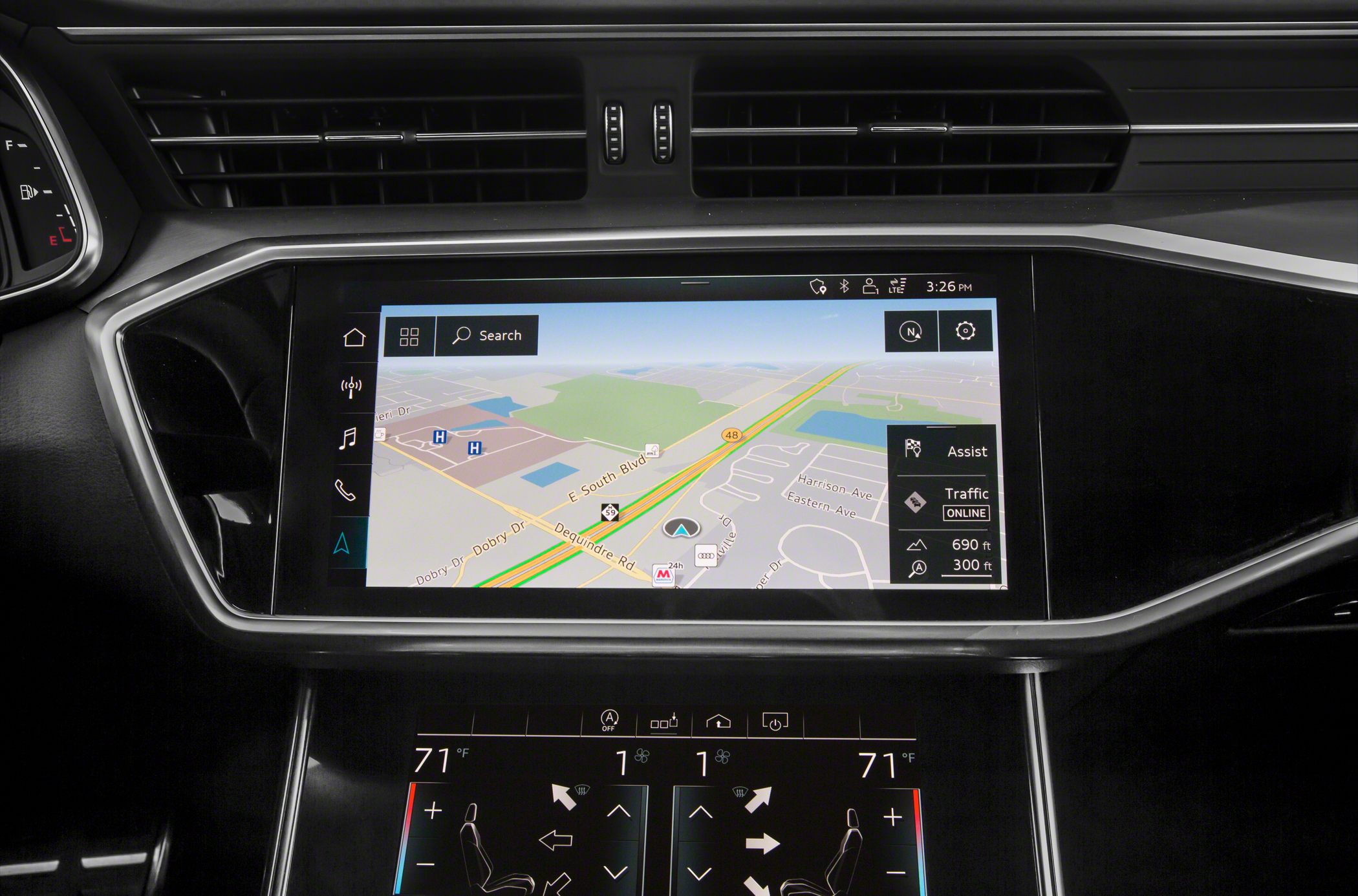 Dual touchscreen displays featuring navigation and climate control panels