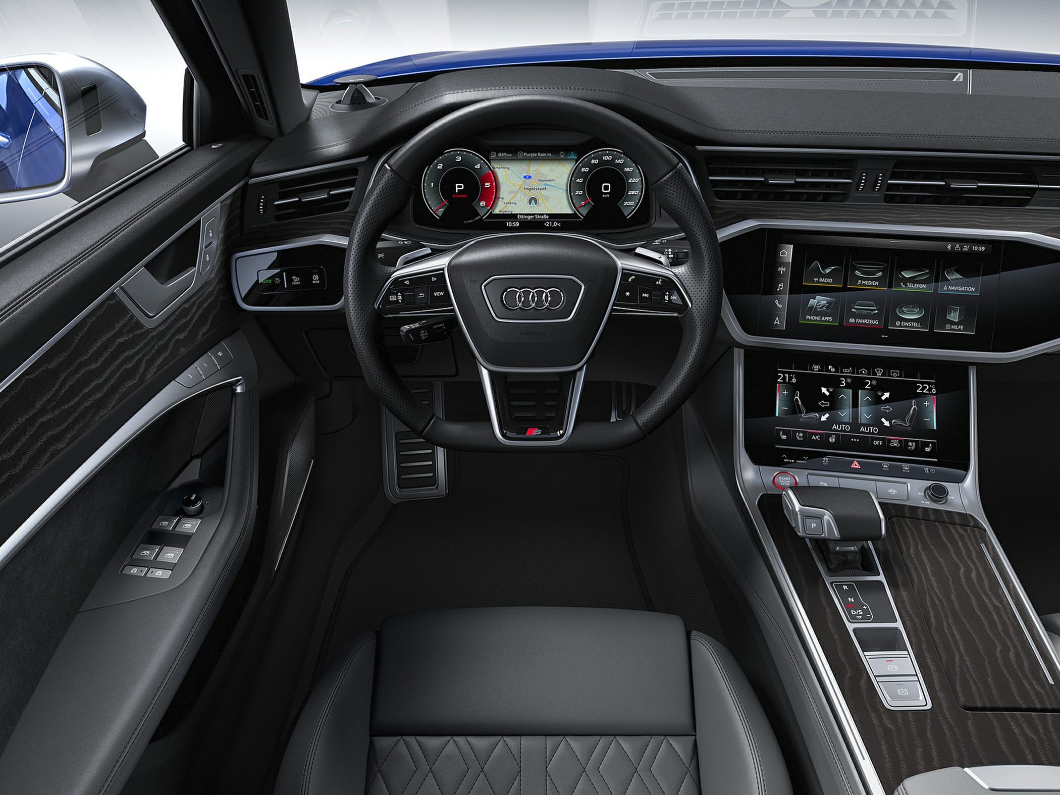 Digital instrument cluster and dual touchscreen infotainment panel with luxury trims