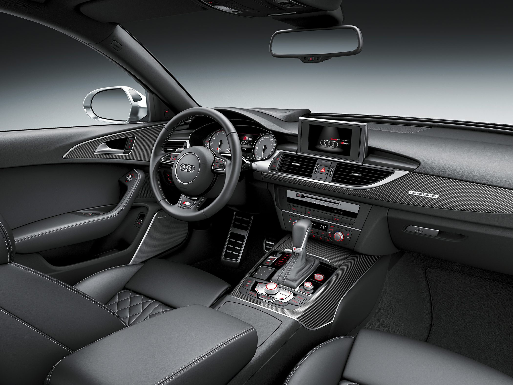 Audi S6 interior with digital display and carbon fiber trim