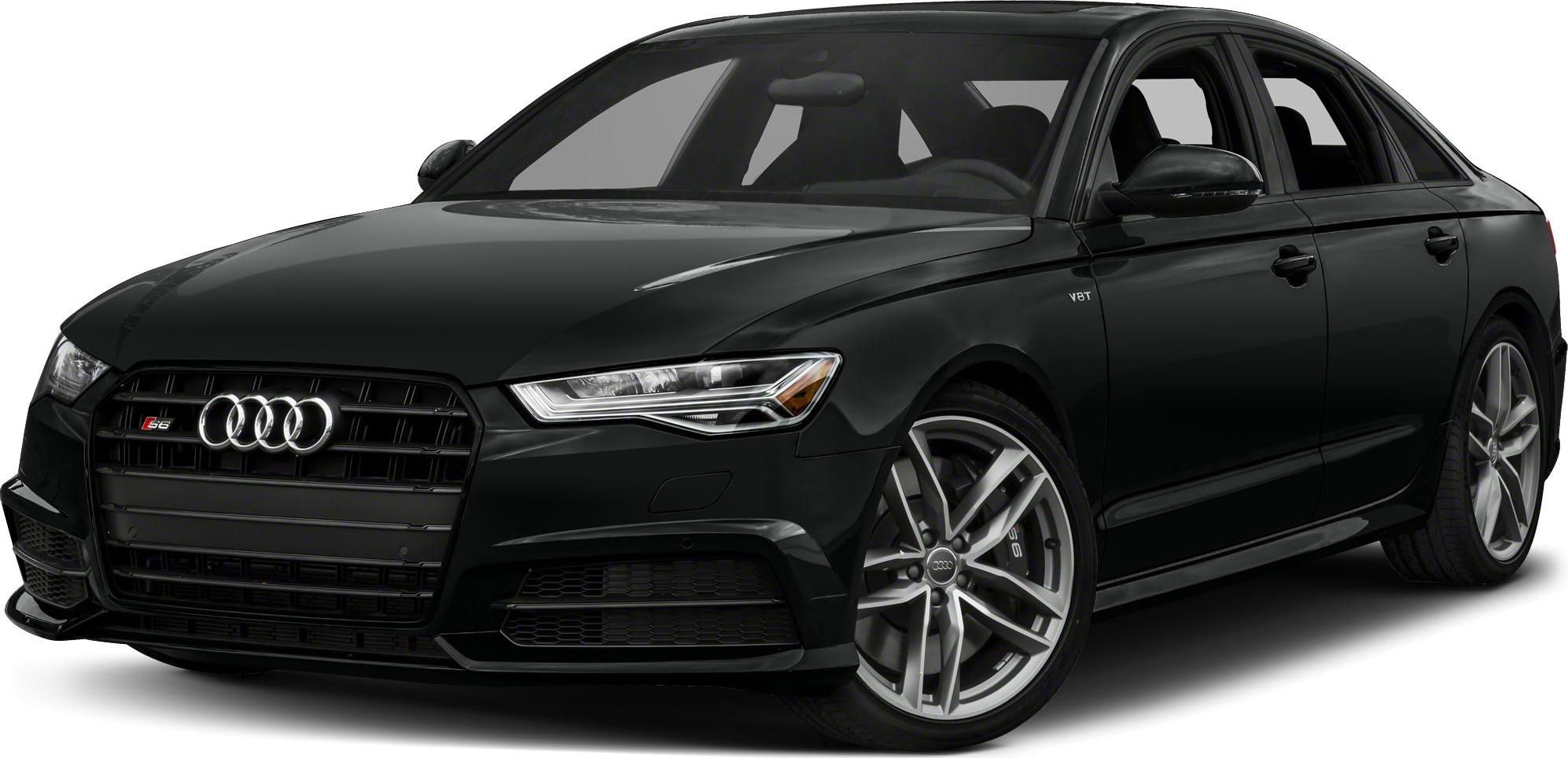 Front view with grille, V8T badge, headlights, and alloy wheels