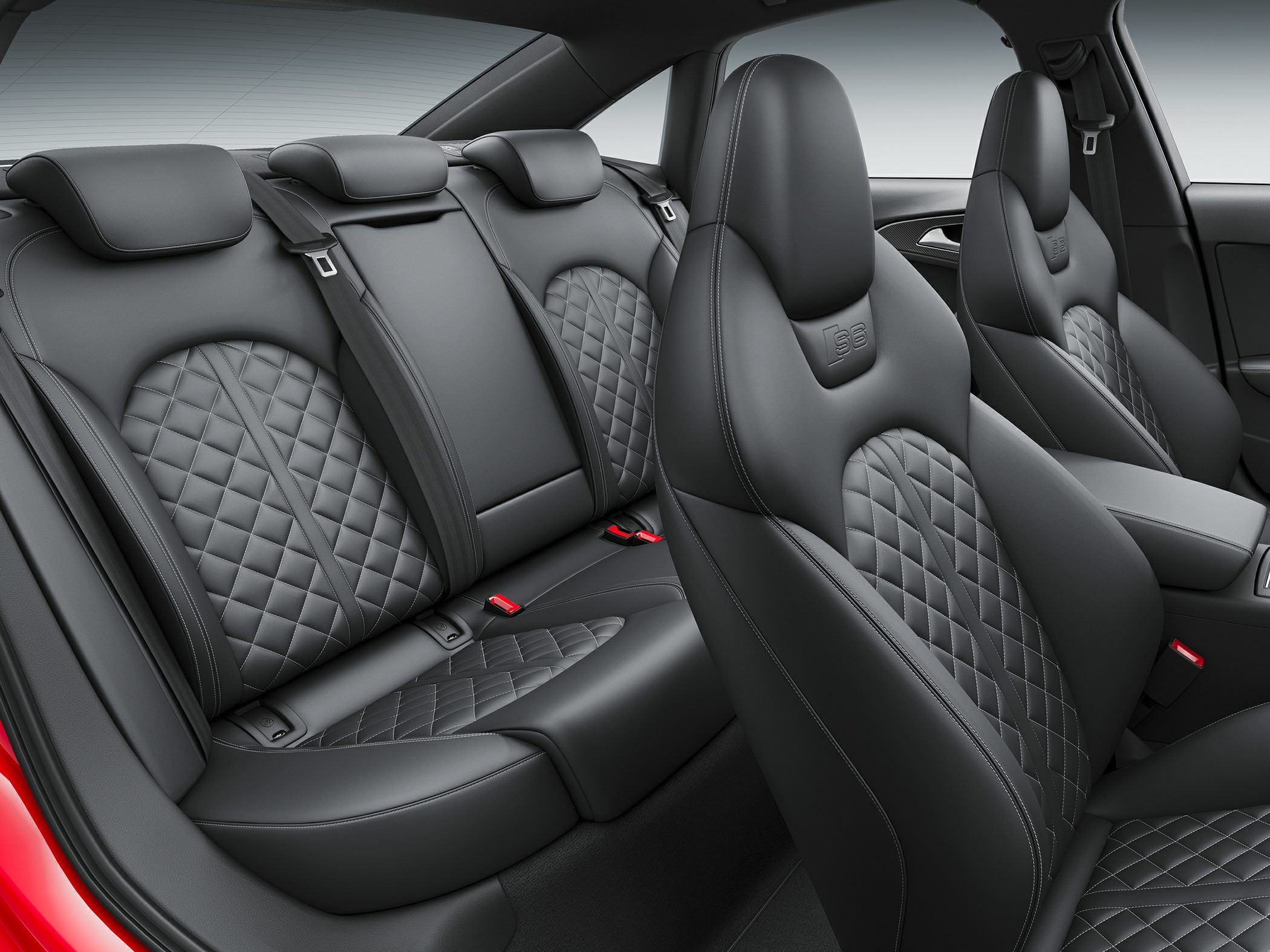 Quilted leather upholstery with sporty front seats and detailed stitching