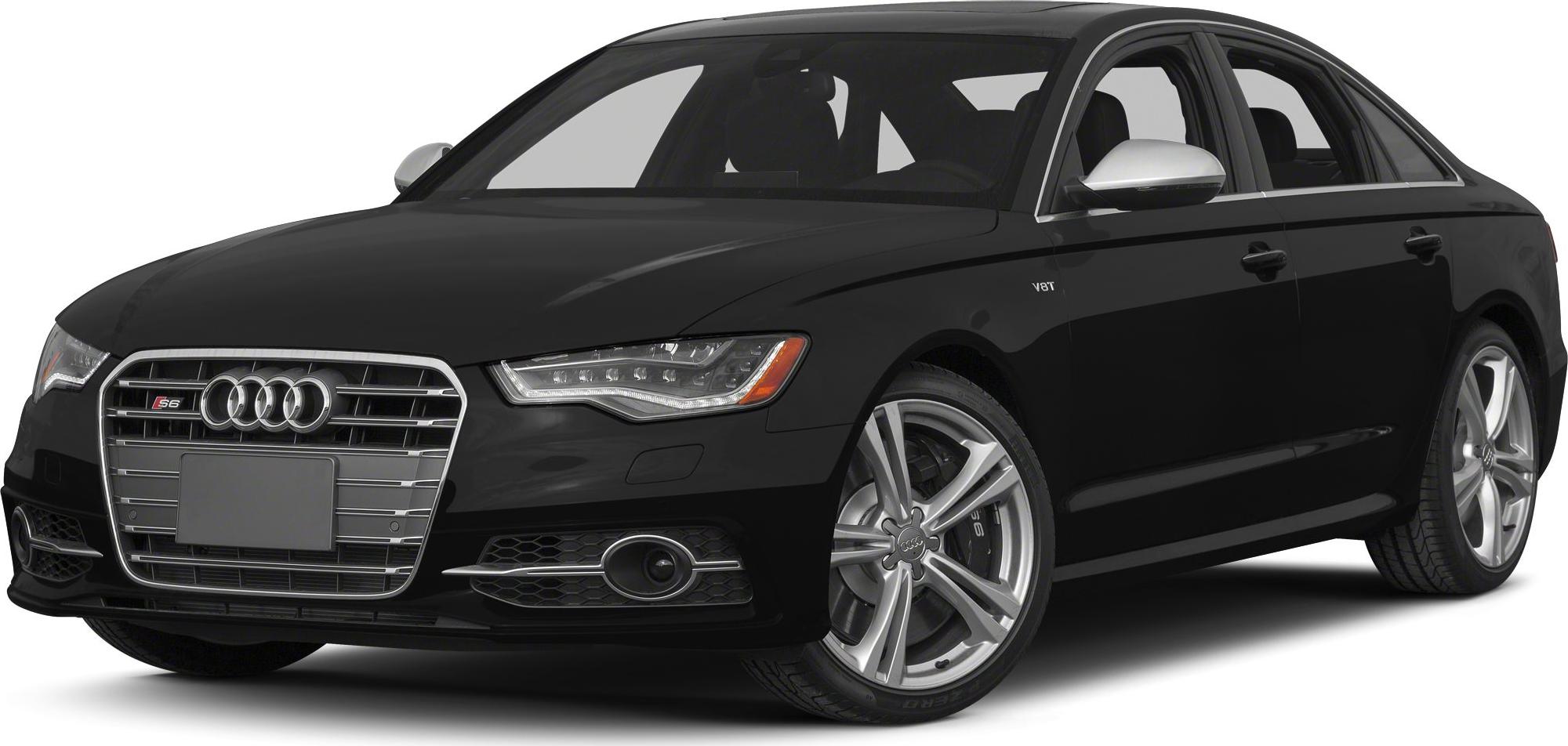 Front grille and alloy wheels of a sleek black sedan