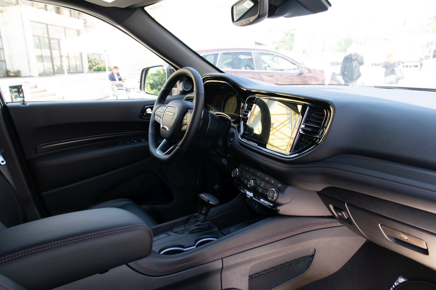Dashboard and steering wheel inside a modern SUV