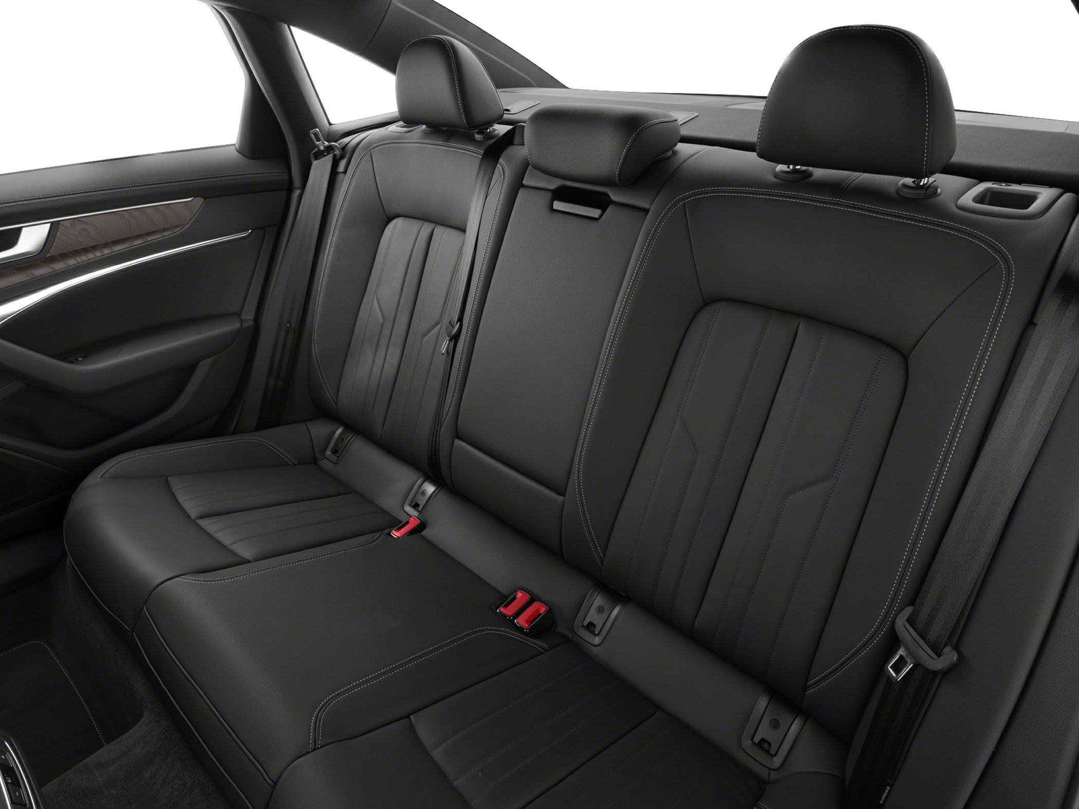 Leather rear seats with detailed stitching in a luxury sedan.