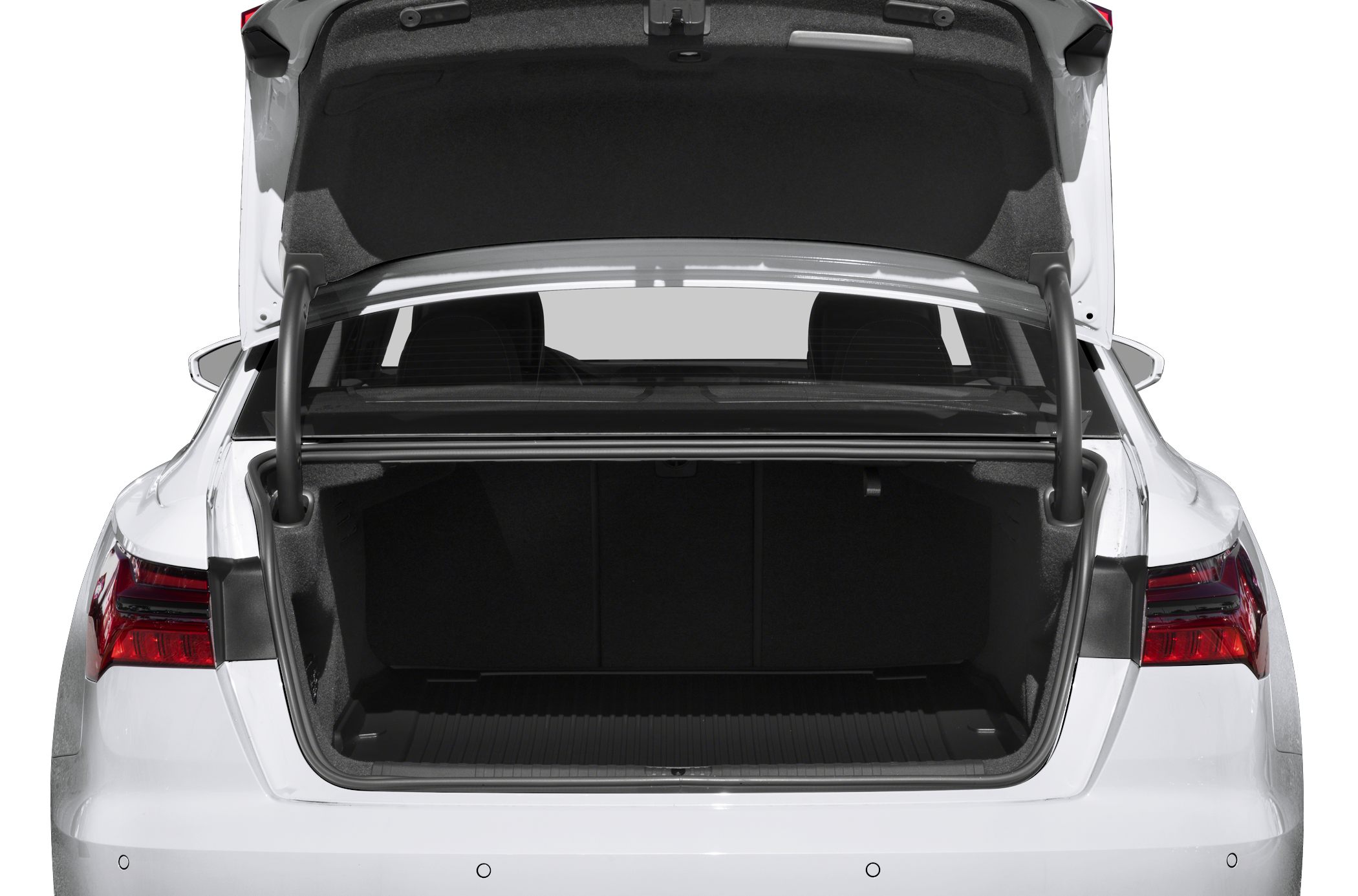 Open trunk with spacious cargo area and tailgate hinges