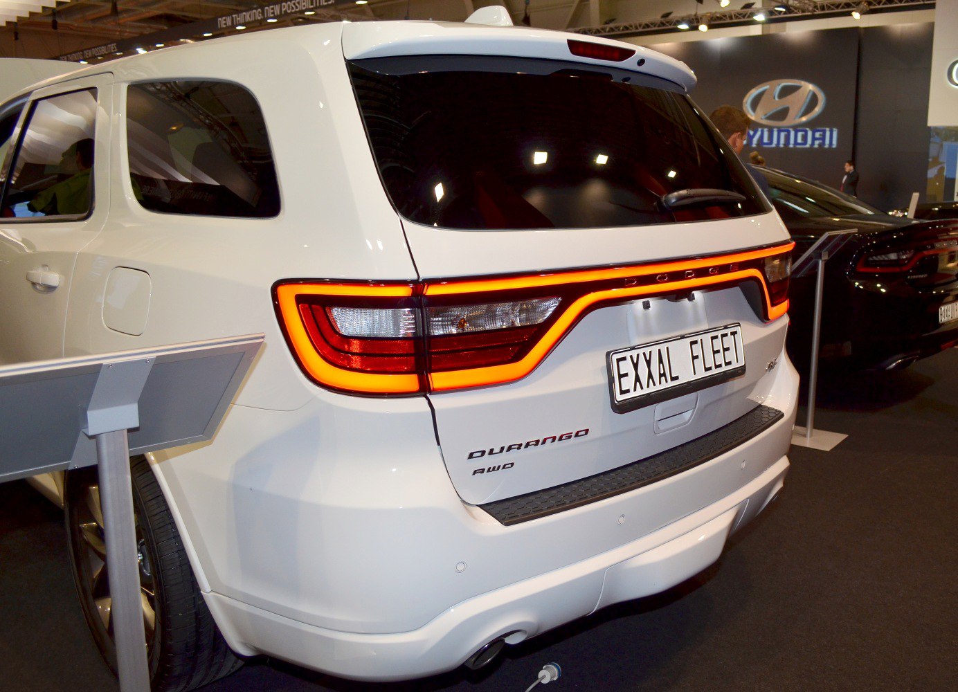 Rear LED tail lights and AWD badge on SUV
