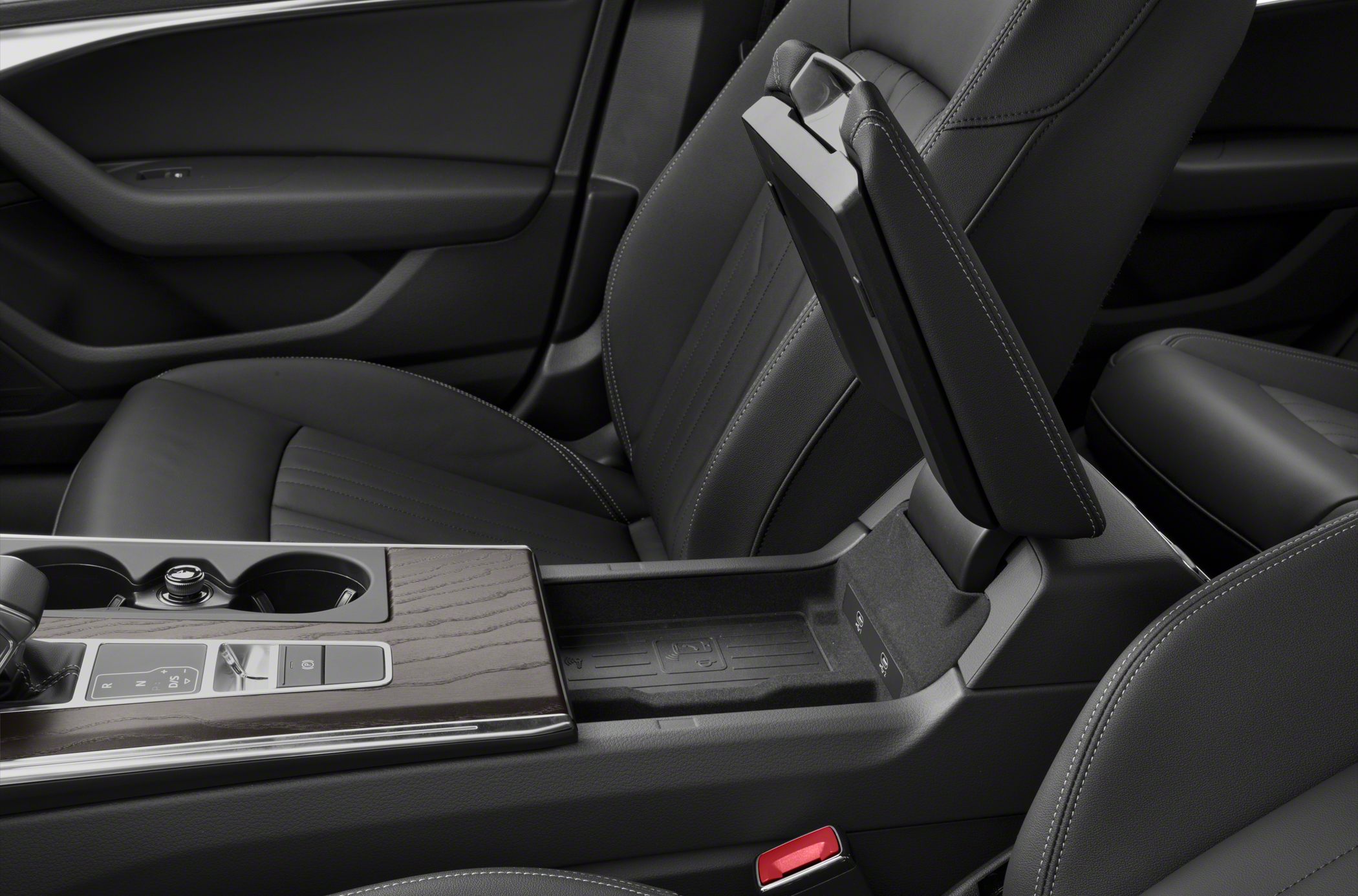 Center console storage with wireless charging and wood trim