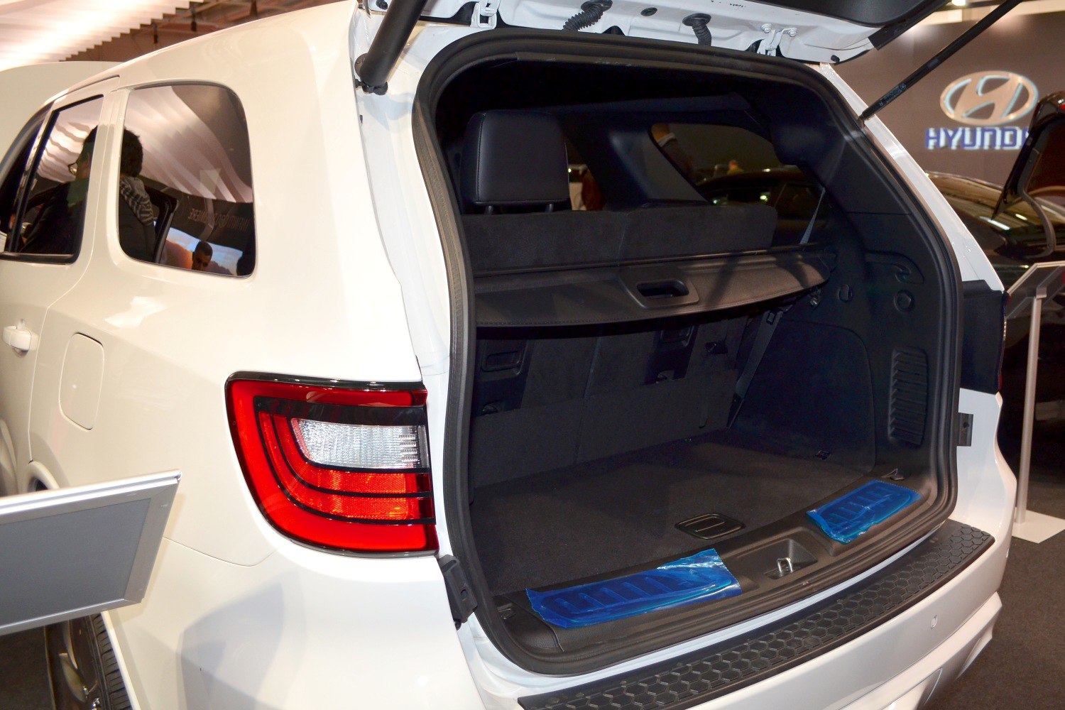 SUV rear open cargo area with distinctive tail light