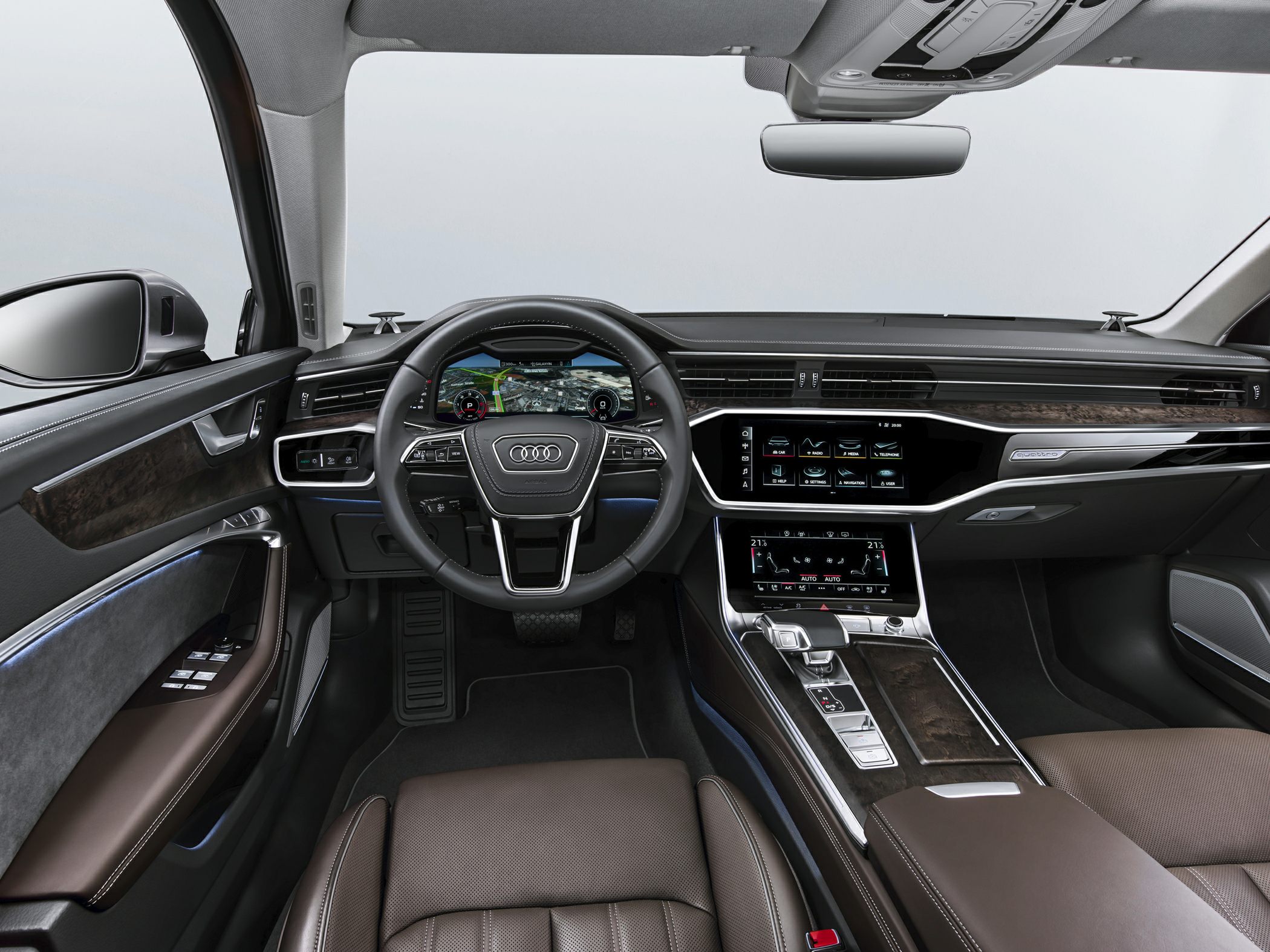 Luxury dashboard and digital steering wheel with dual touchscreen panels.