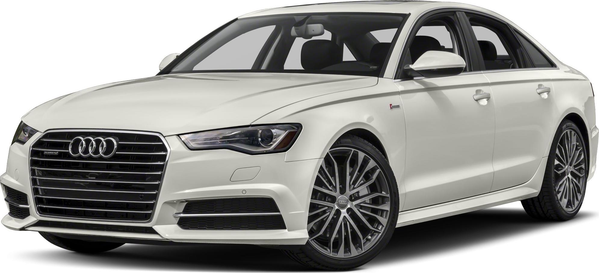 White luxury sedan with distinctive grille and alloy wheels