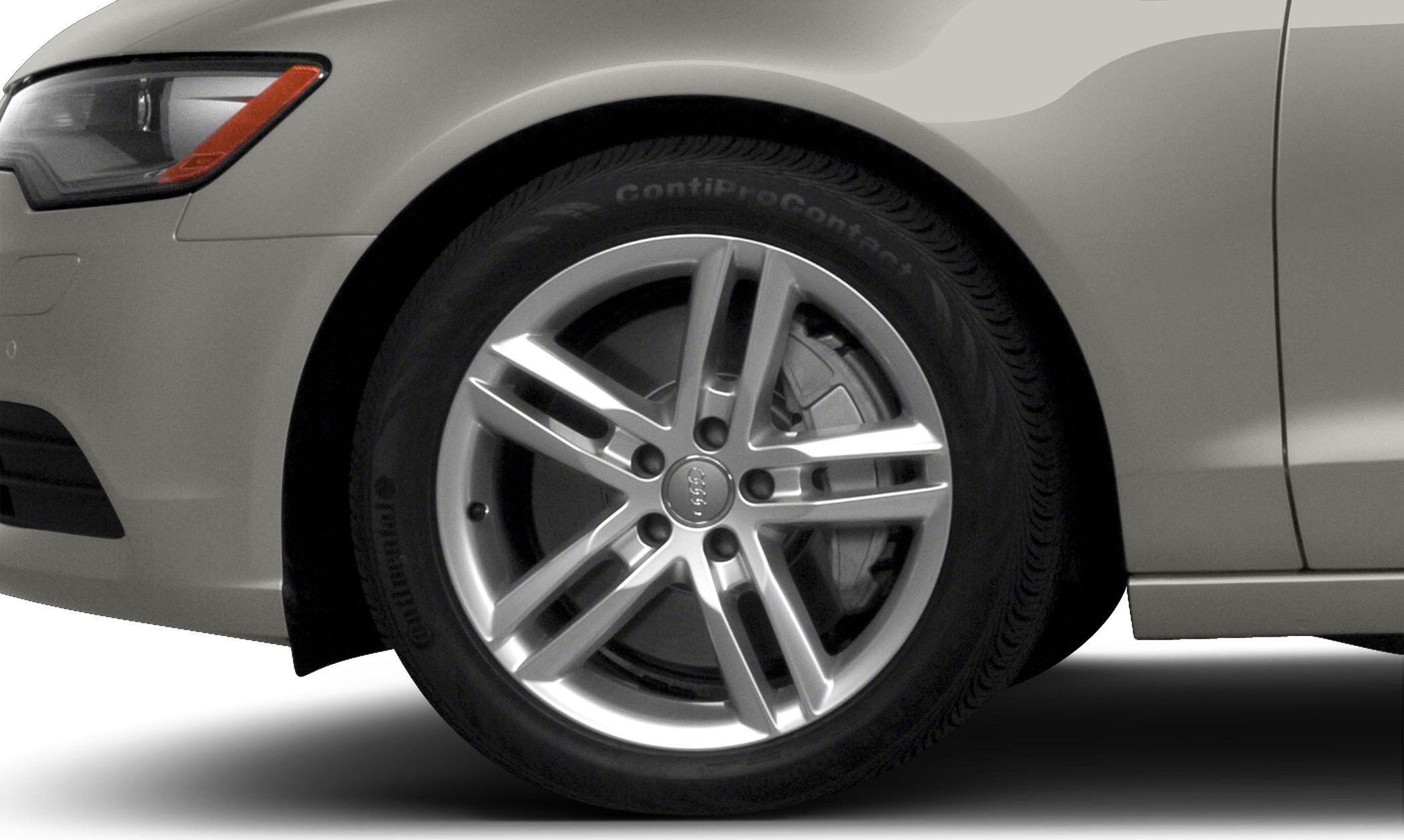 Close-up of Audi A6 alloy wheel and front fender
