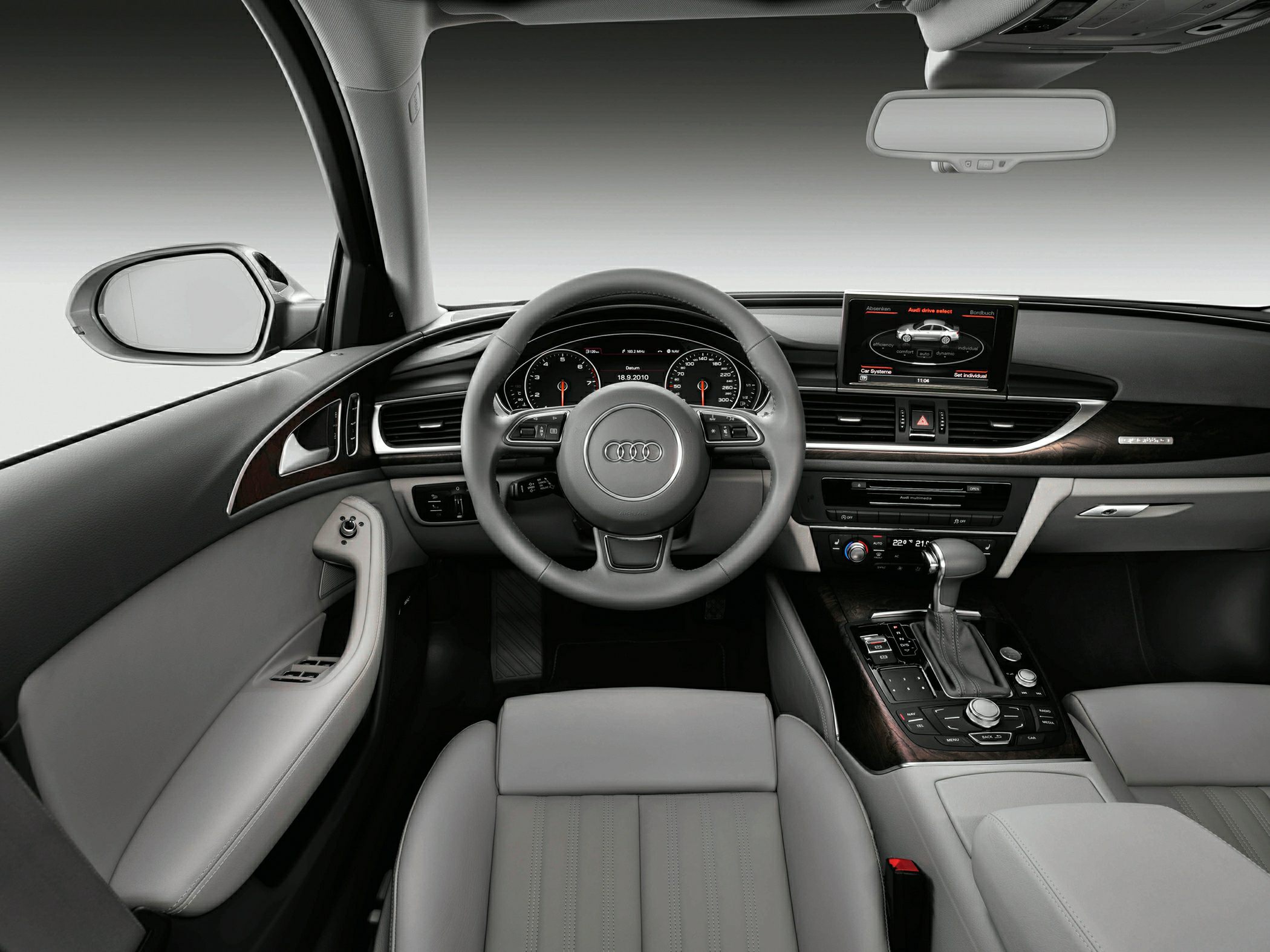 Dashboard, steering wheel with controls, multimedia display