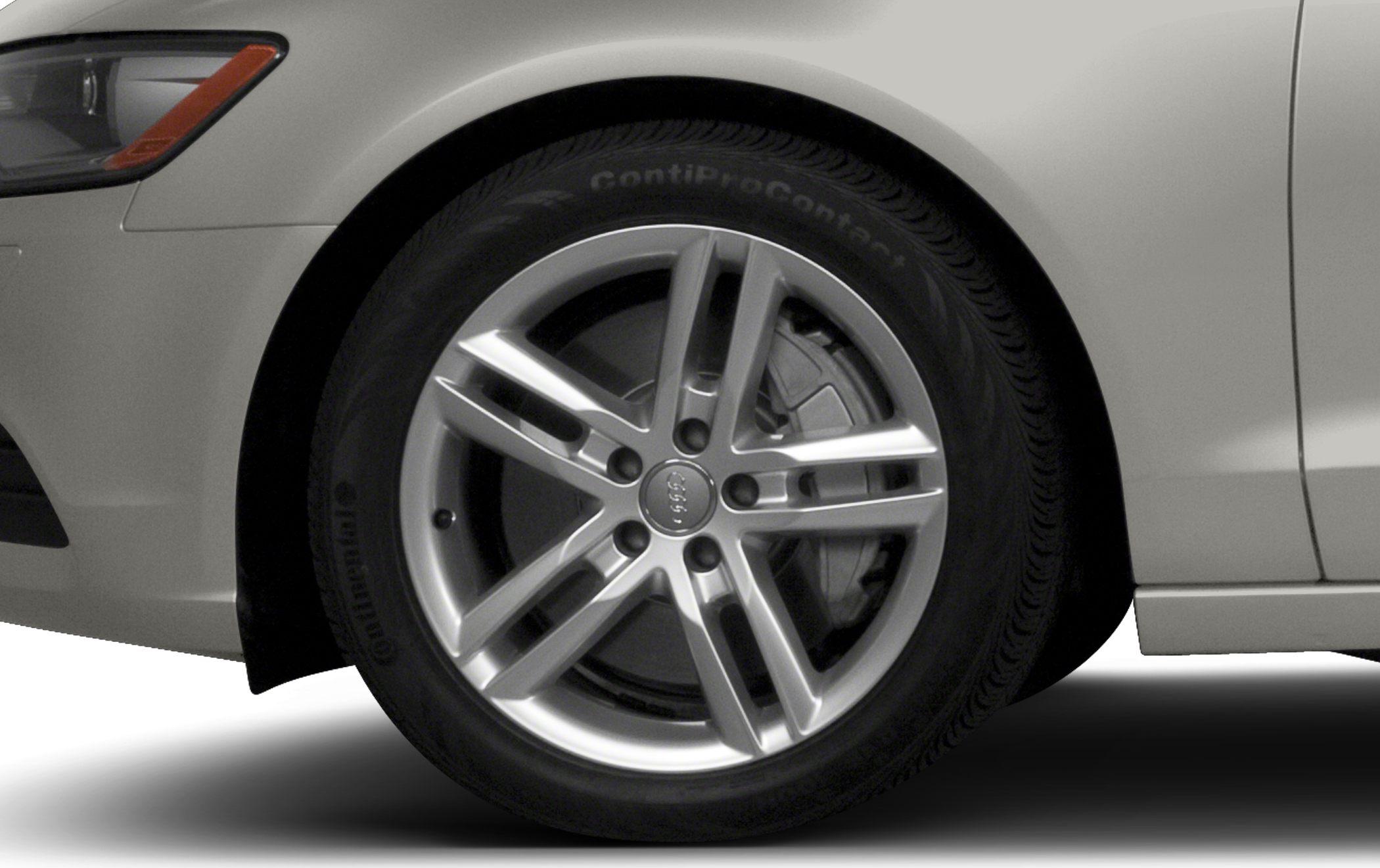Alloy wheel rim and brake disc close-up view