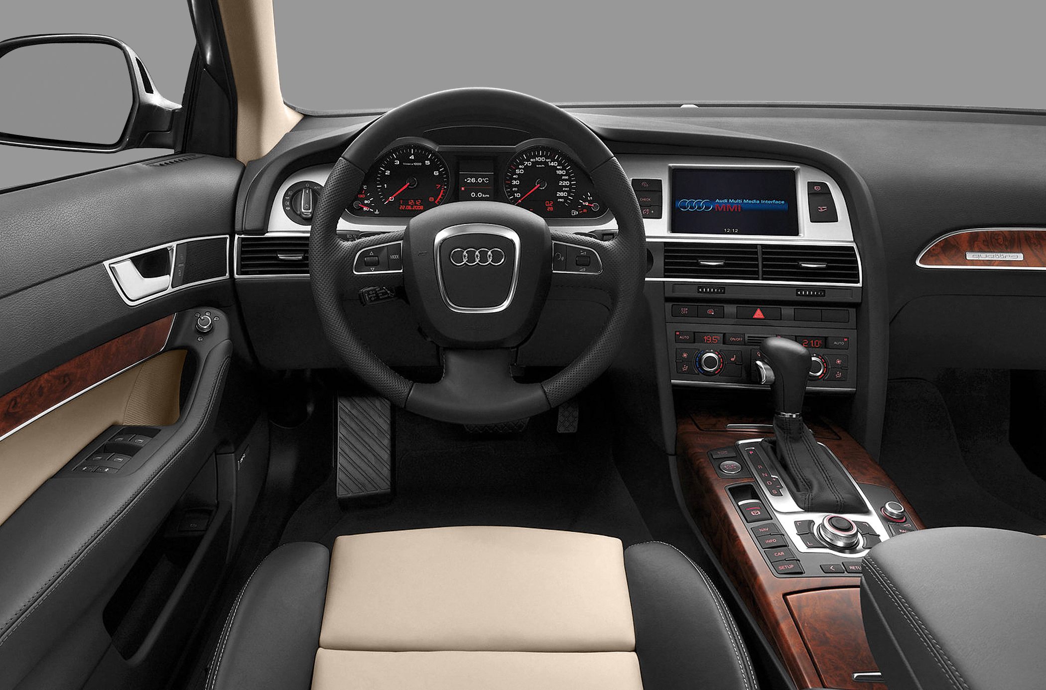 Dashboard, steering wheel, and center console with multimedia interface