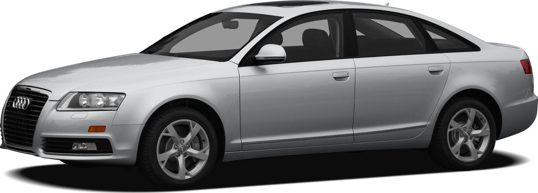 Silver sedan with 5-spoke alloy wheels and aerodynamic body shape