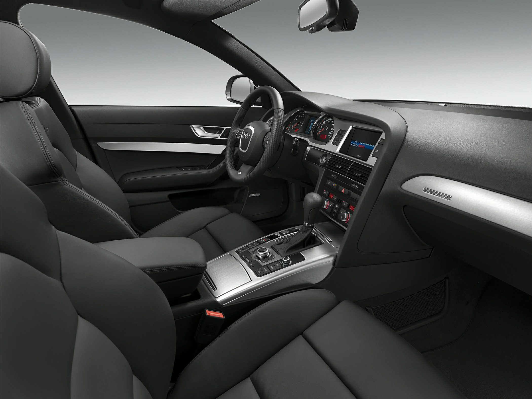 Premium car interior with dashboard, steering wheel, and center console
