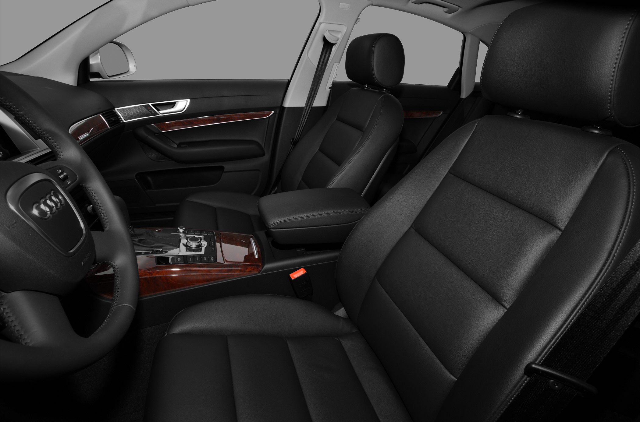 Black leather seats and wood trim dashboard interior