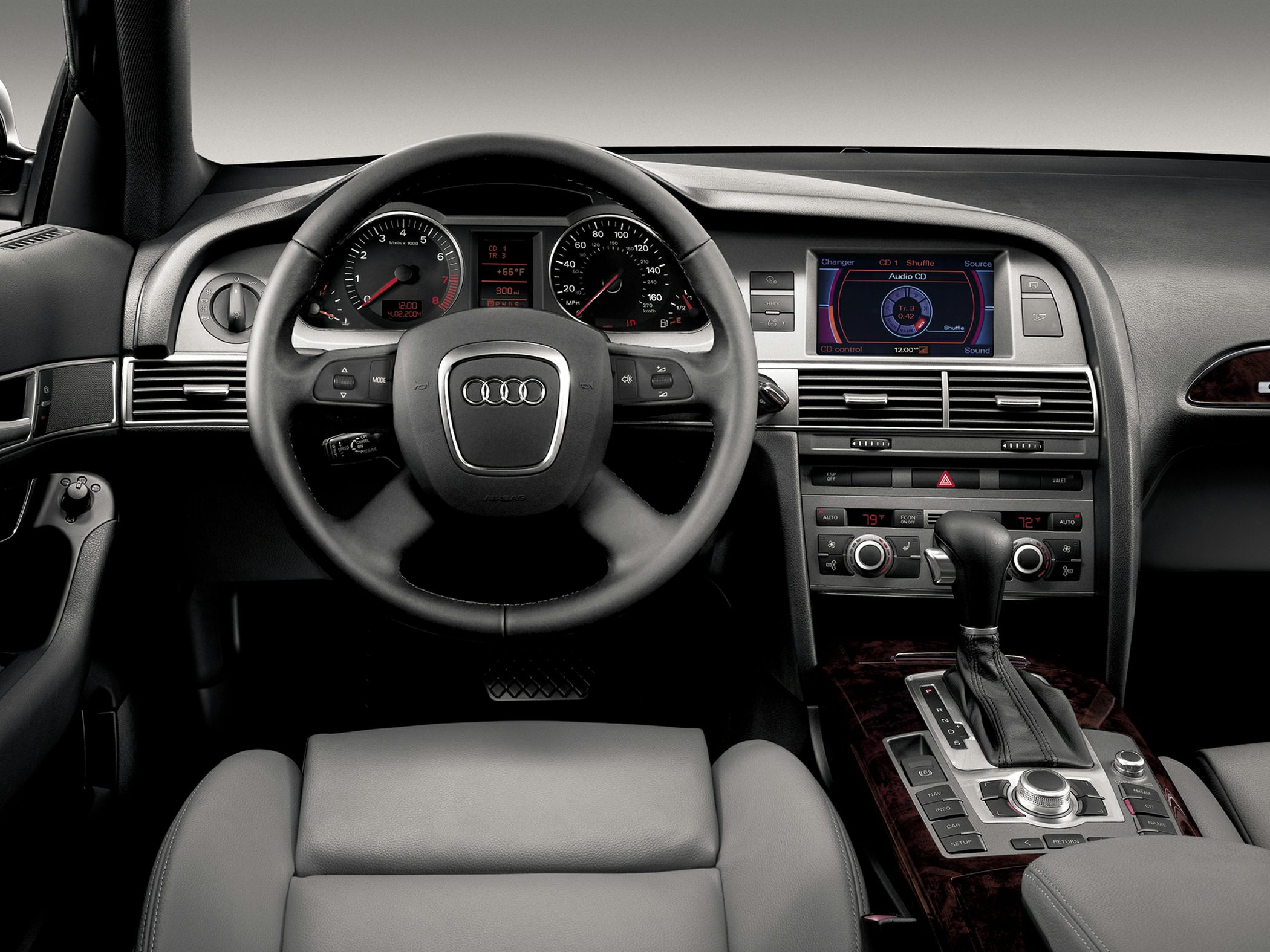 Dashboard and steering wheel with instrument cluster and infotainment system