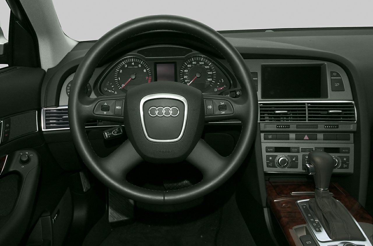 Audi steering wheel and dashboard interior with controls