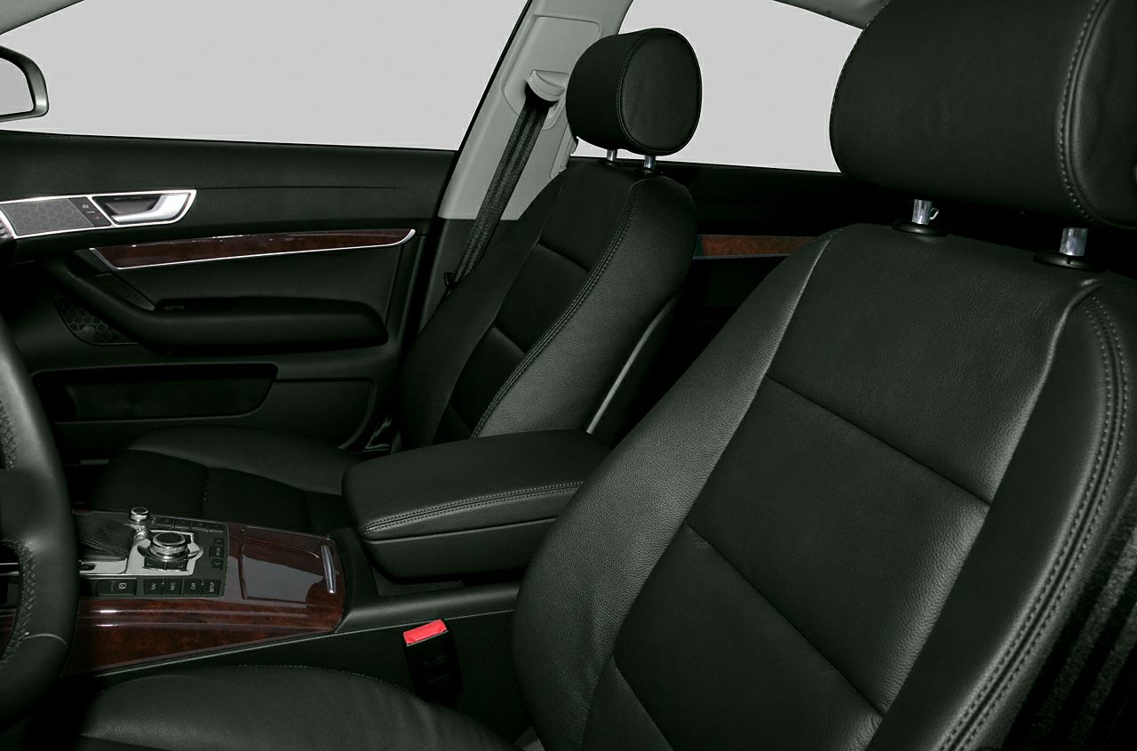 Front leather seats with wood trim and door panel details
