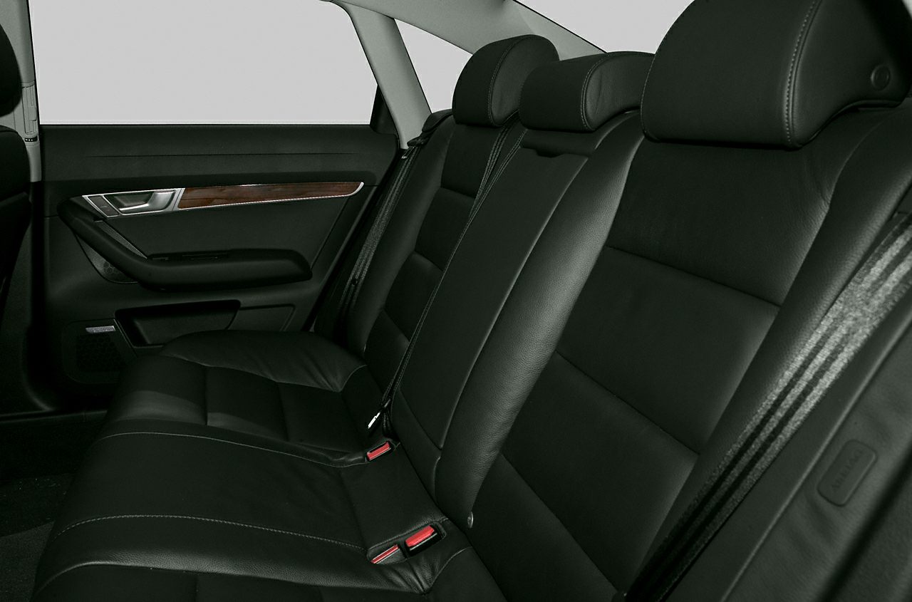 Rear leather seats and wood trim door panel