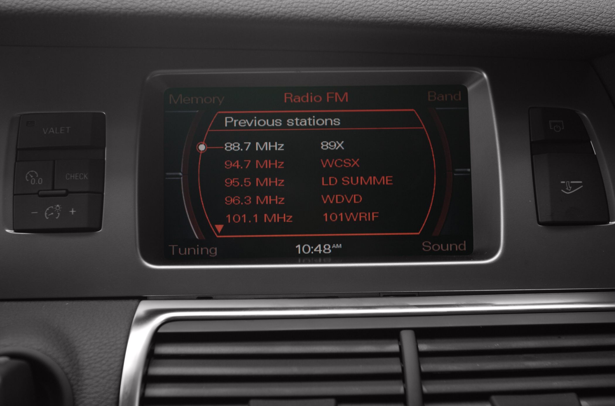 FM radio display with previous station list and control buttons