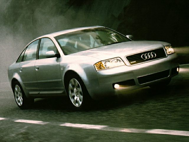 Silver sedan with fog lights and alloy wheels