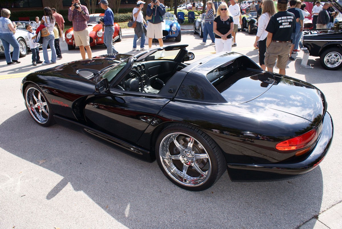 Black convertible with chrome wheels and sporty design