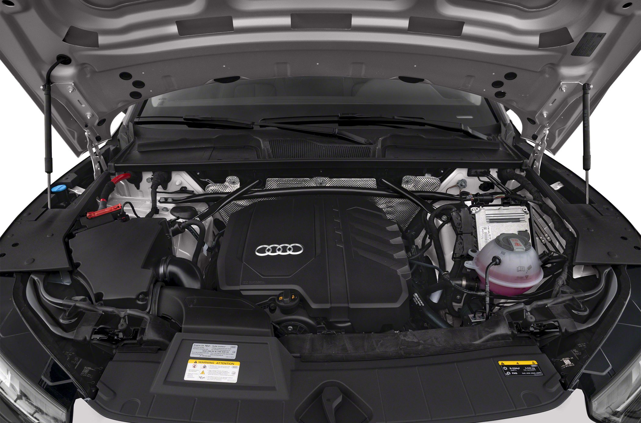 Open engine bay with Audi-branded engine cover and components