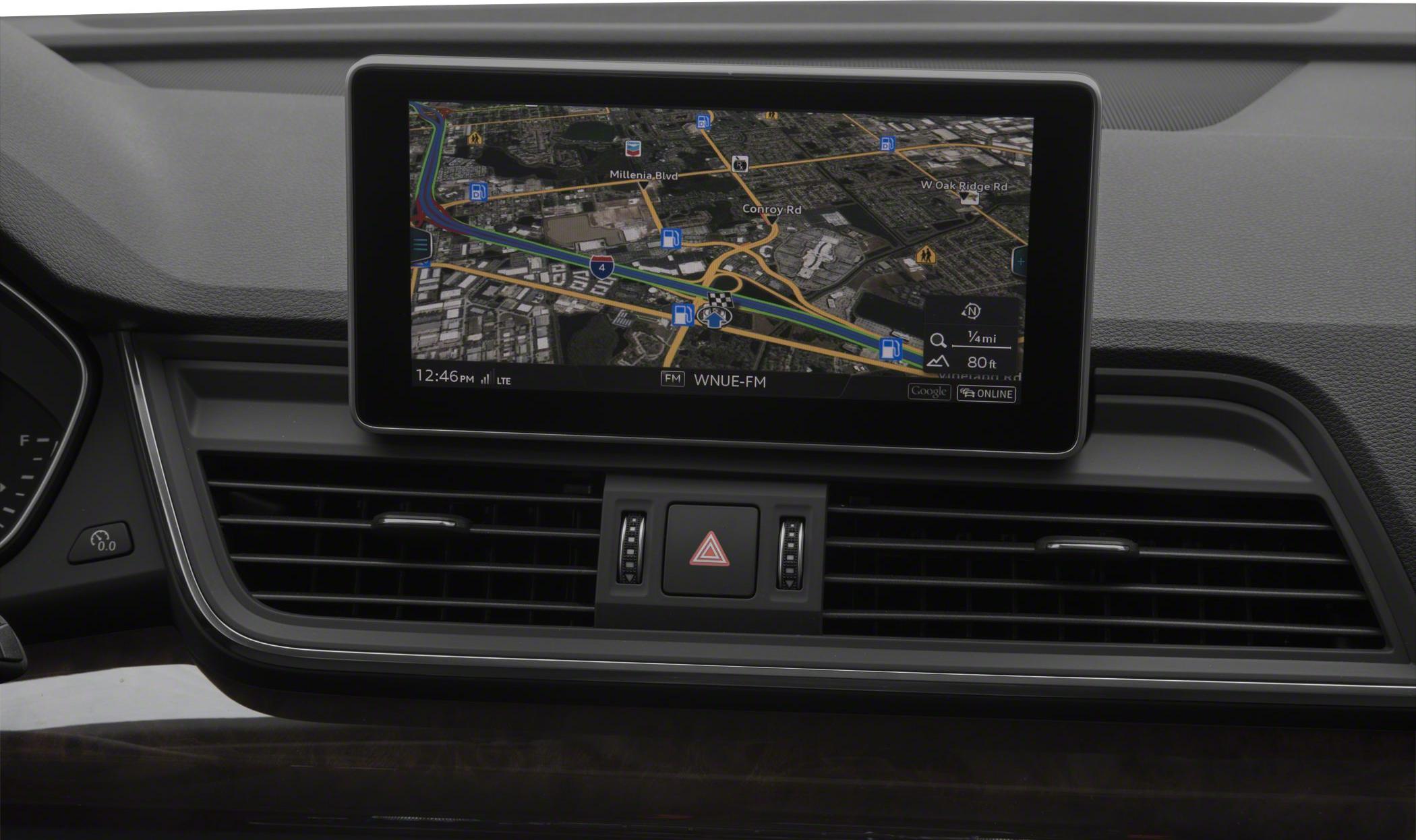 Central infotainment display with navigation map and dashboard air vents