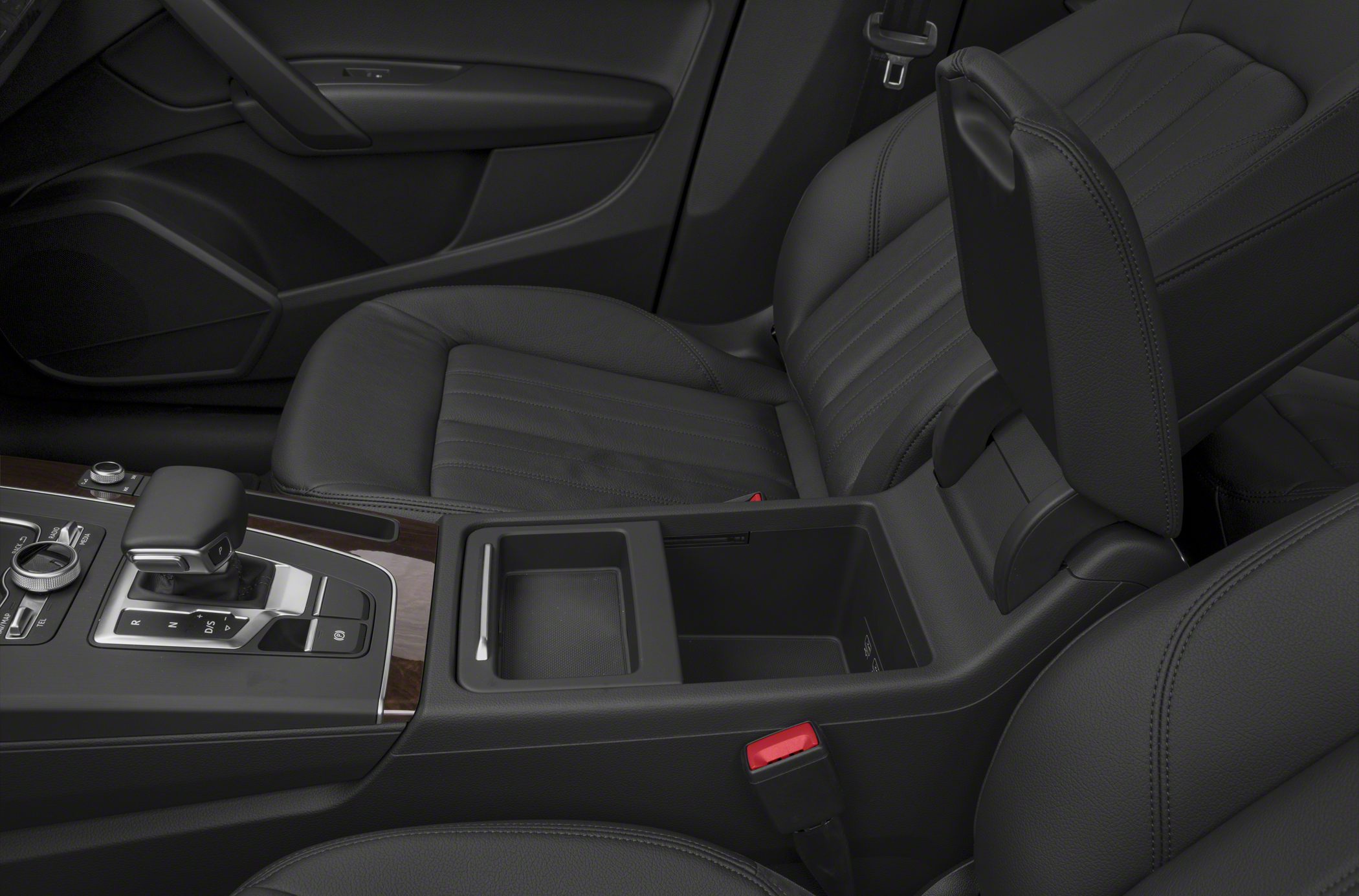 Detailed center console and leather seats with armrest