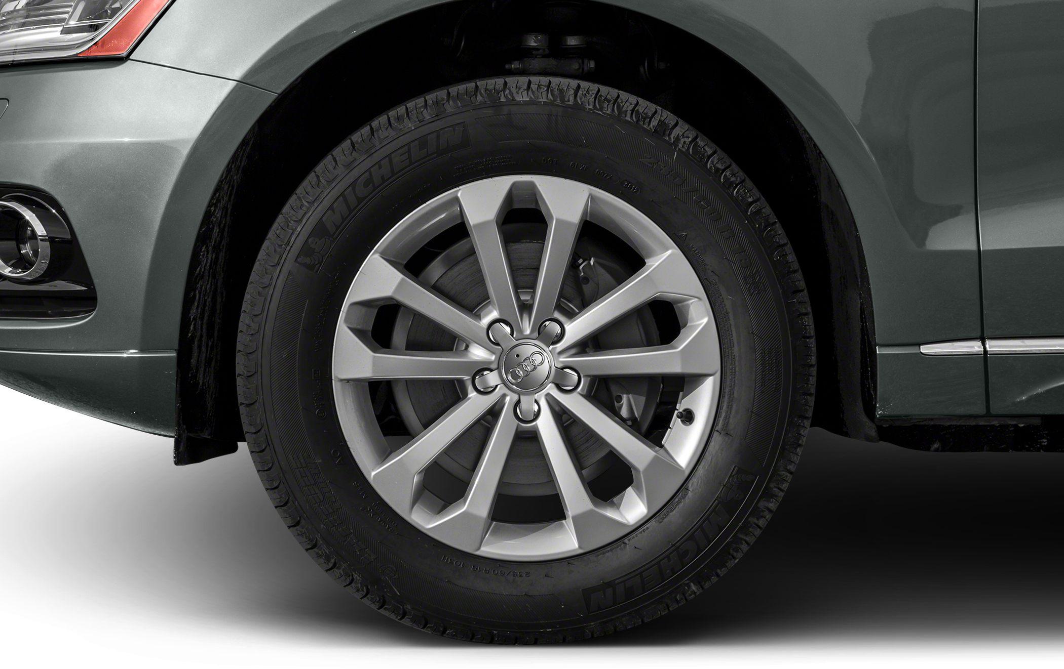 Close-up of alloy wheel with Michelin tire on vehicle front side
