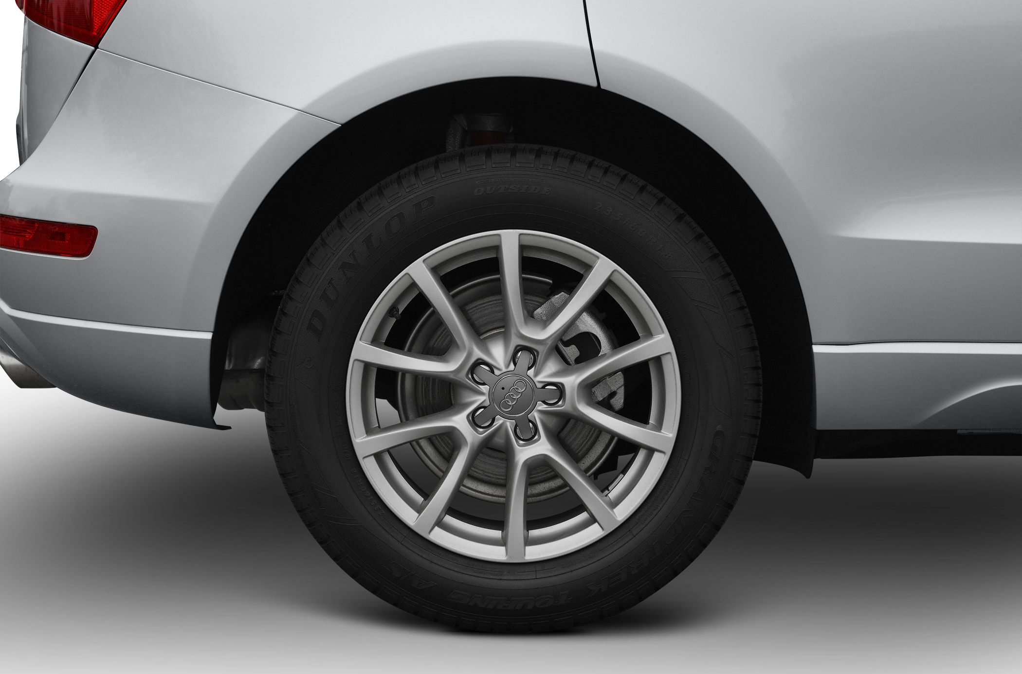 Close-up of alloy wheel and tire on rear side of vehicle