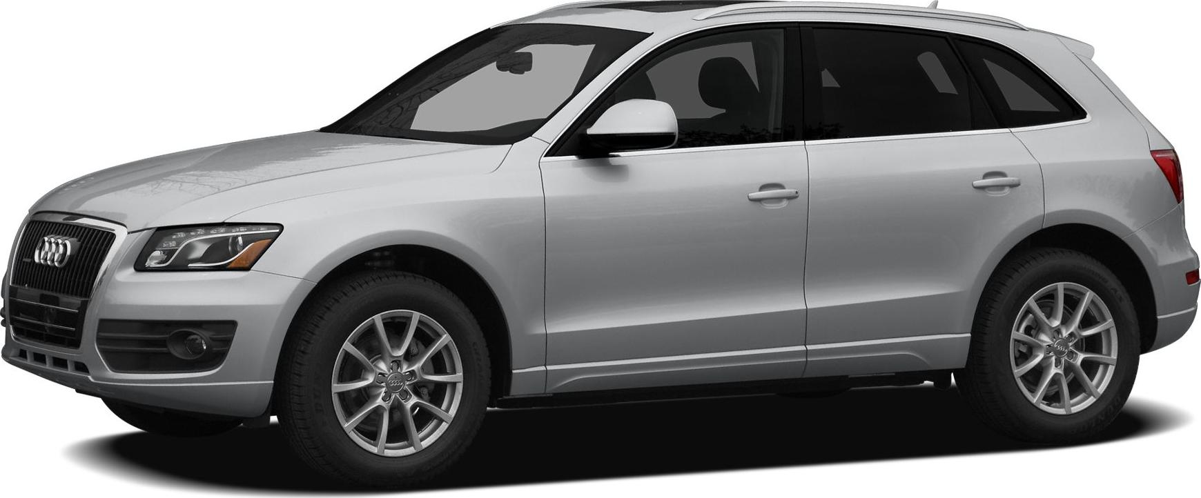 Silver SUV side view with prominent front grille and alloy wheels