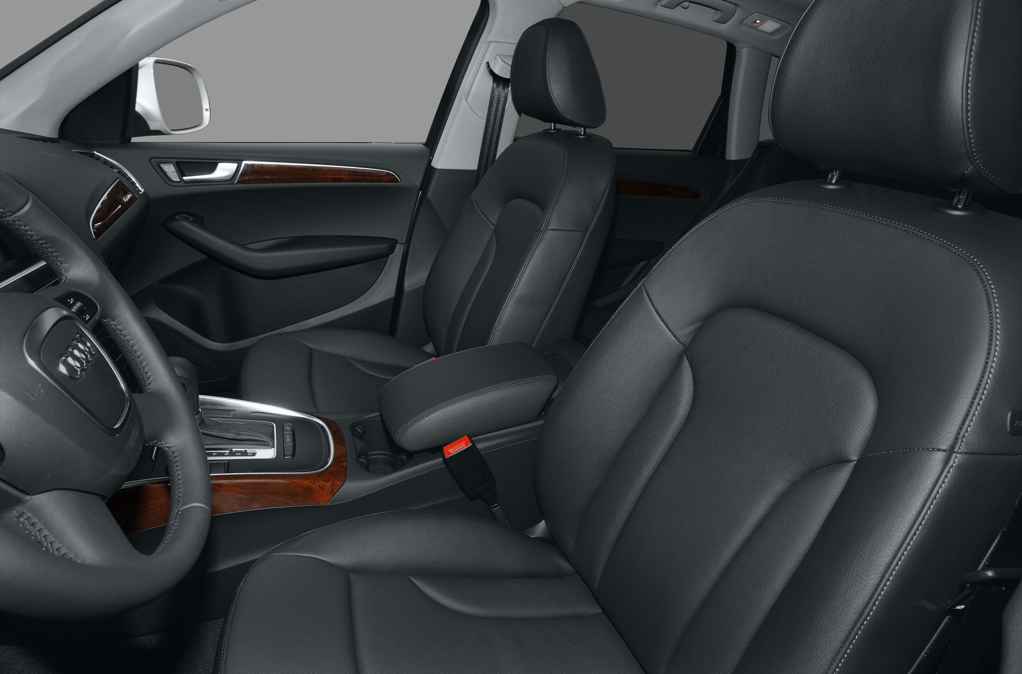 Black leather seats and wood trim interior accents