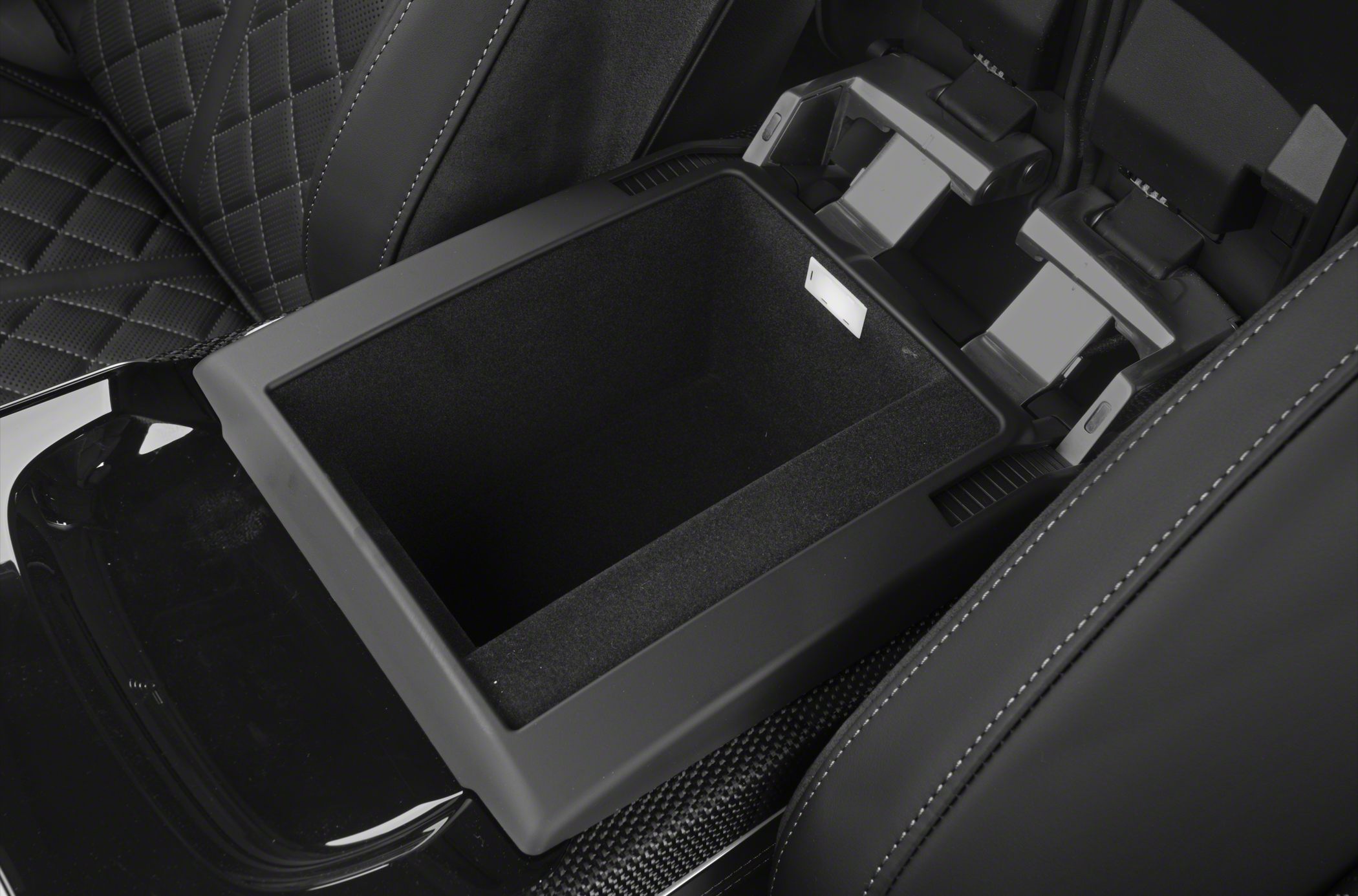 Center console storage compartment and quilted leather seats